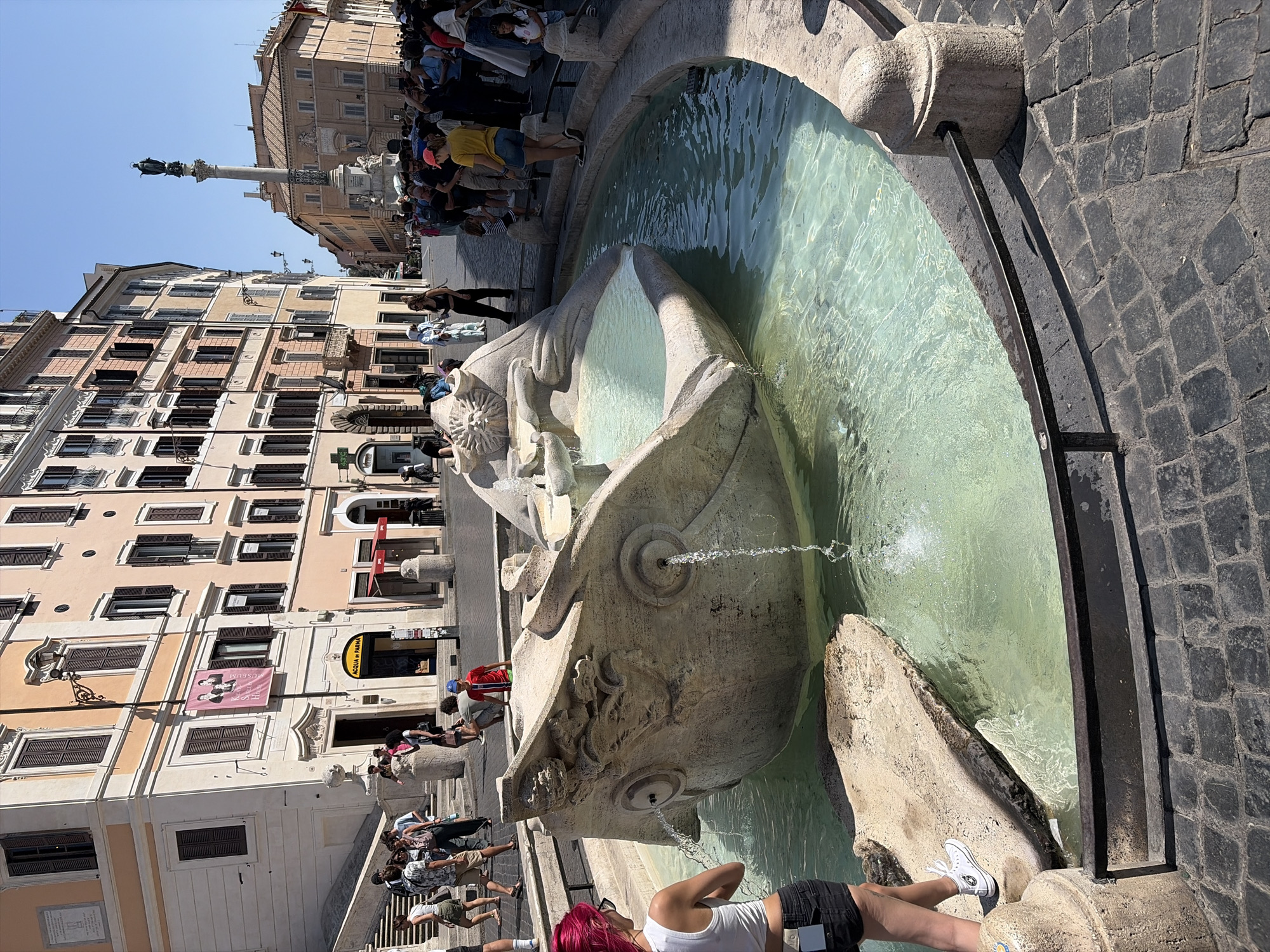 Spanish Steps area: crowds, cobblestones, and luxury storefronts