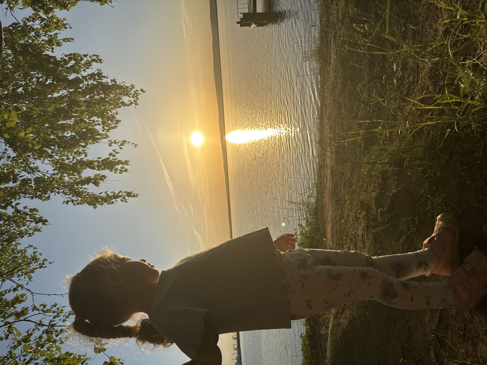 Sunset leisure activities documented along Kama River in Chaikovsky