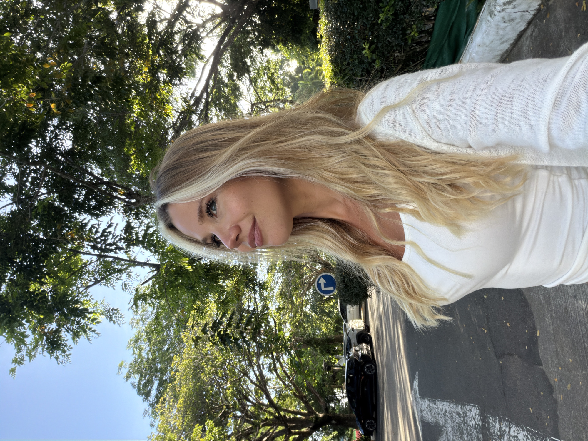 Selfies and street scenes near Karon's white Buddha statue