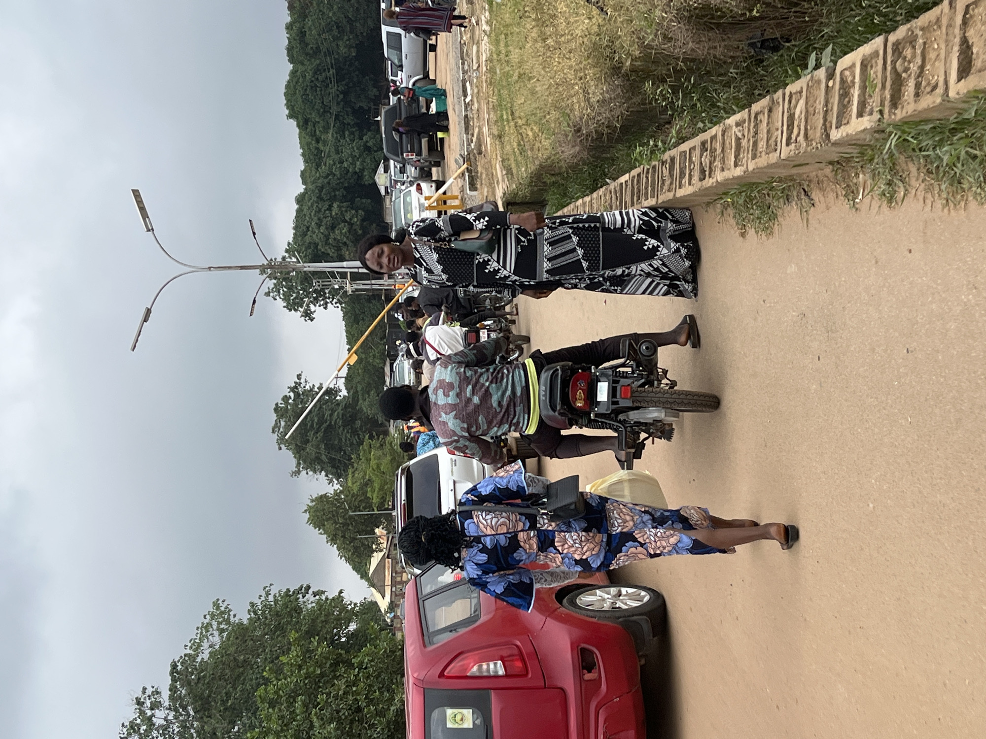 Morning foot traffic near a church in Abuja, Nigeria