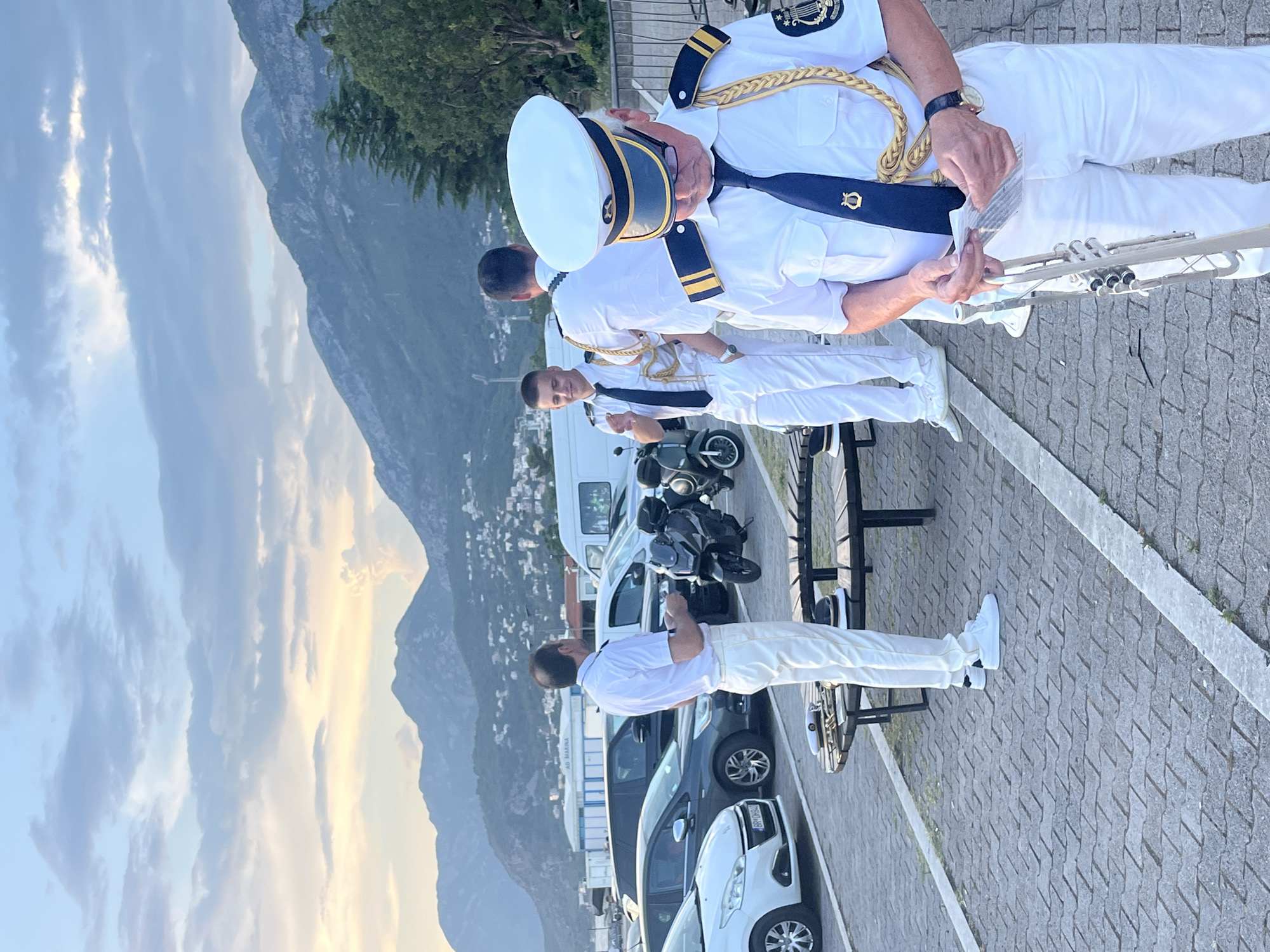 Marching band assembles at Šušanj marina at sunset