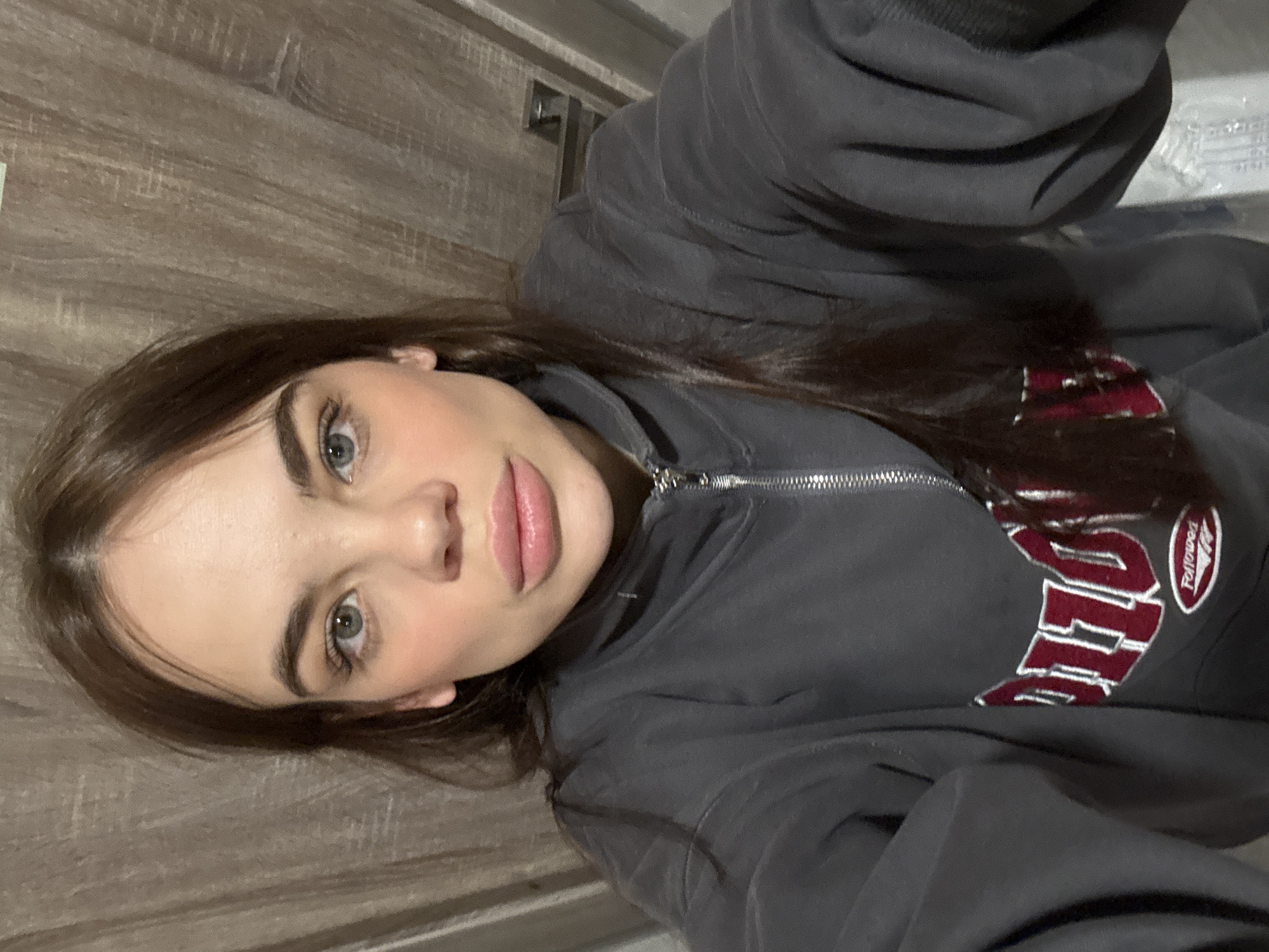 Woman Takes Selfies in Gray Sweatshirt in Anapa