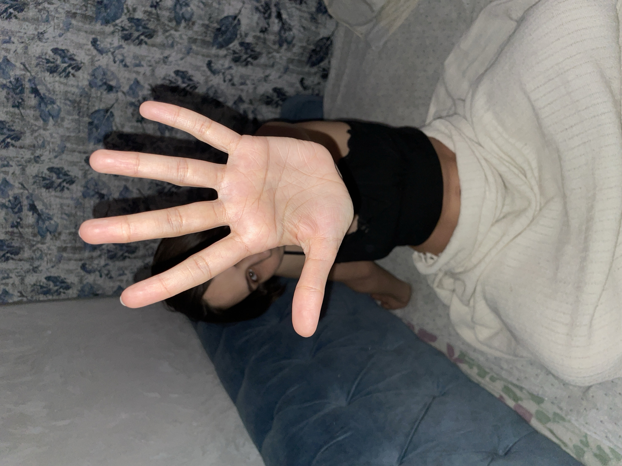 Person photographed on bed in Izhevsk, Russia