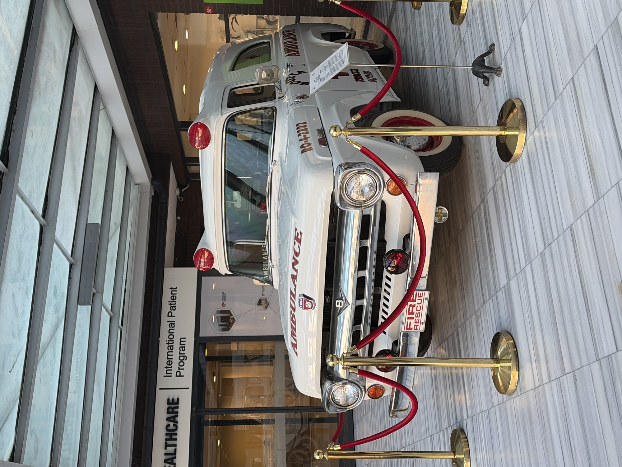 Vintage ambulance displayed in Turkish healthcare facility lobby