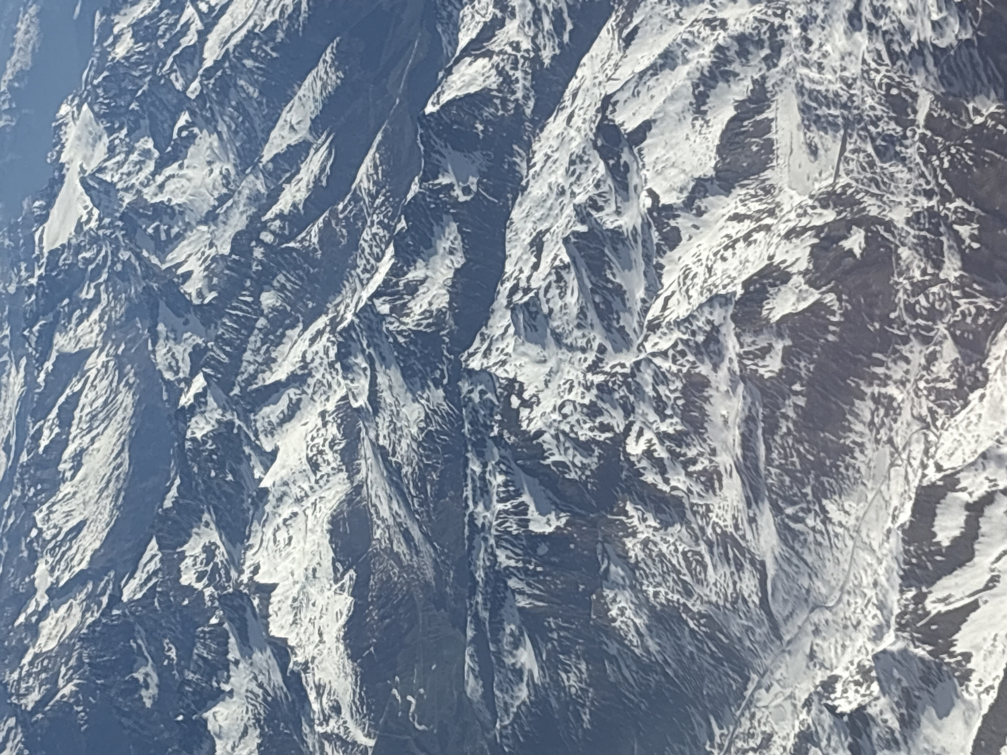 Snow-dusted Alpine peaks observed in northern Italy mountains