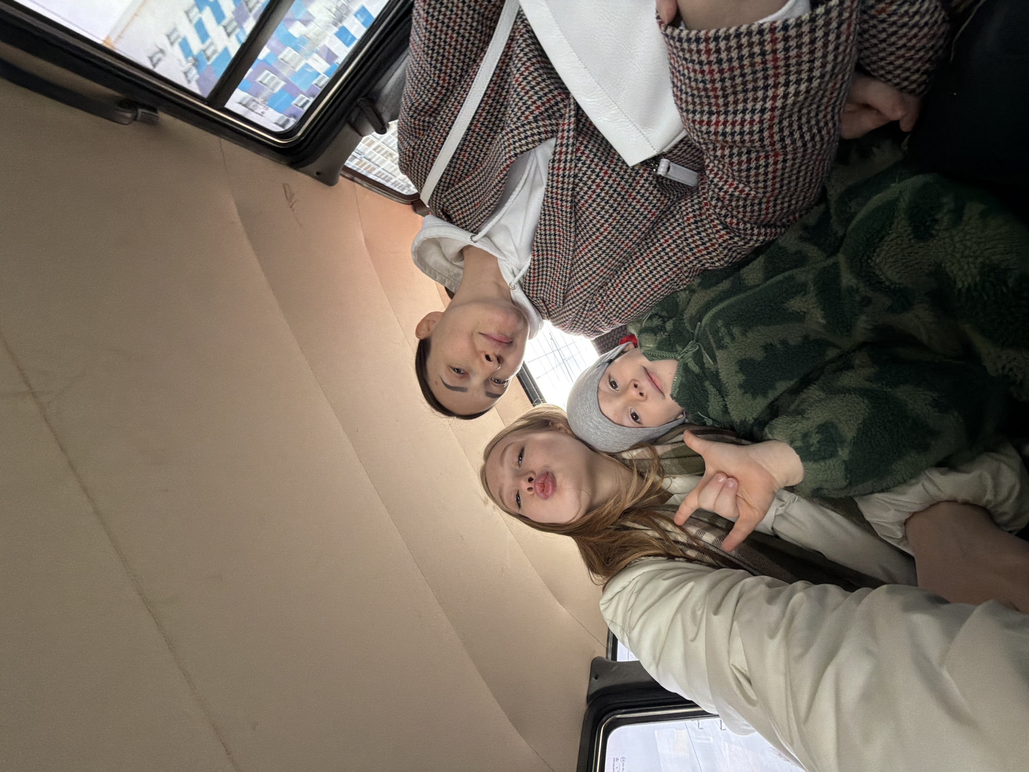 Family group photographed in vehicle in Zasechnoye, Russia