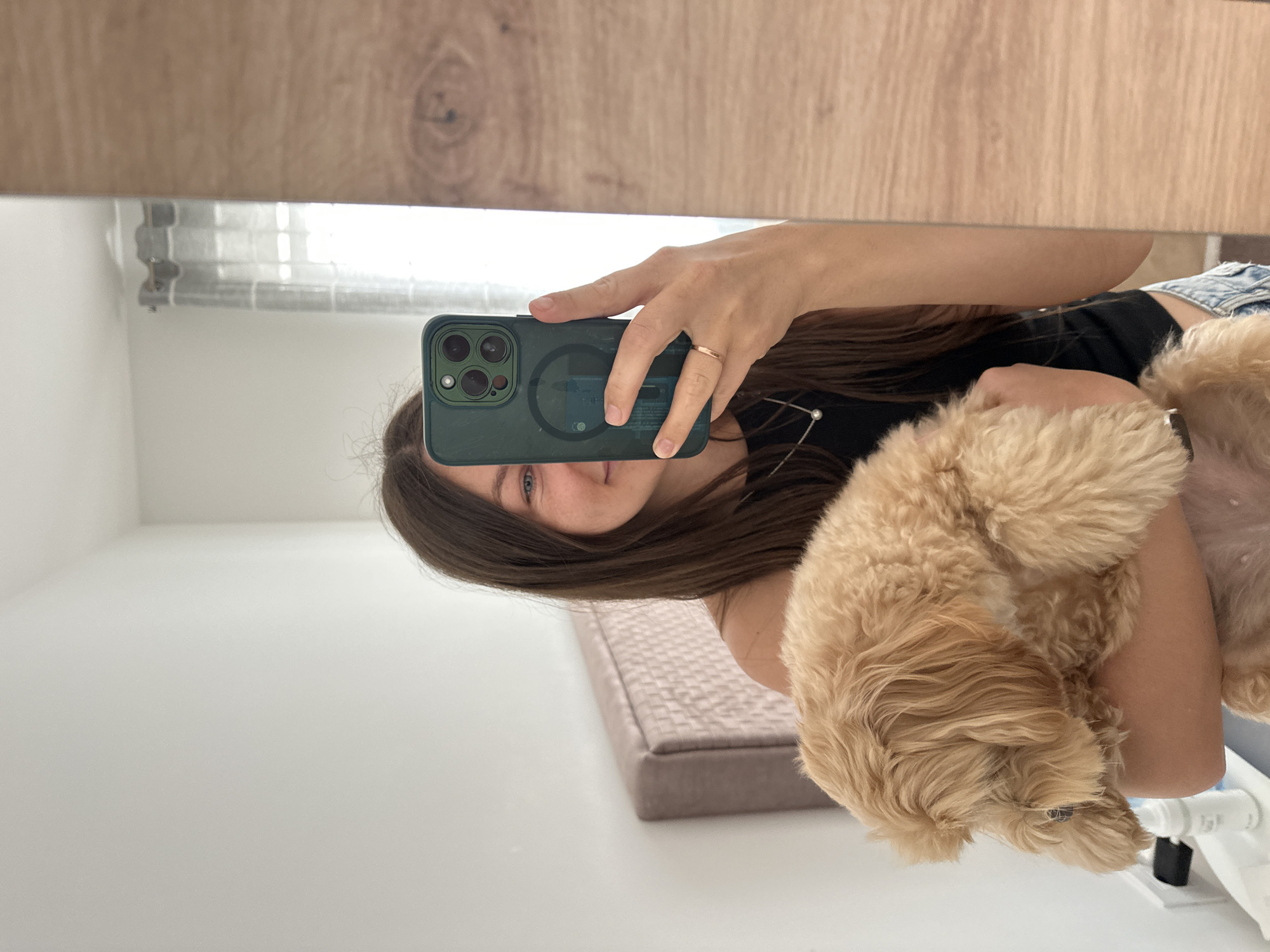 Woman takes selfie with dog in Montenegro village