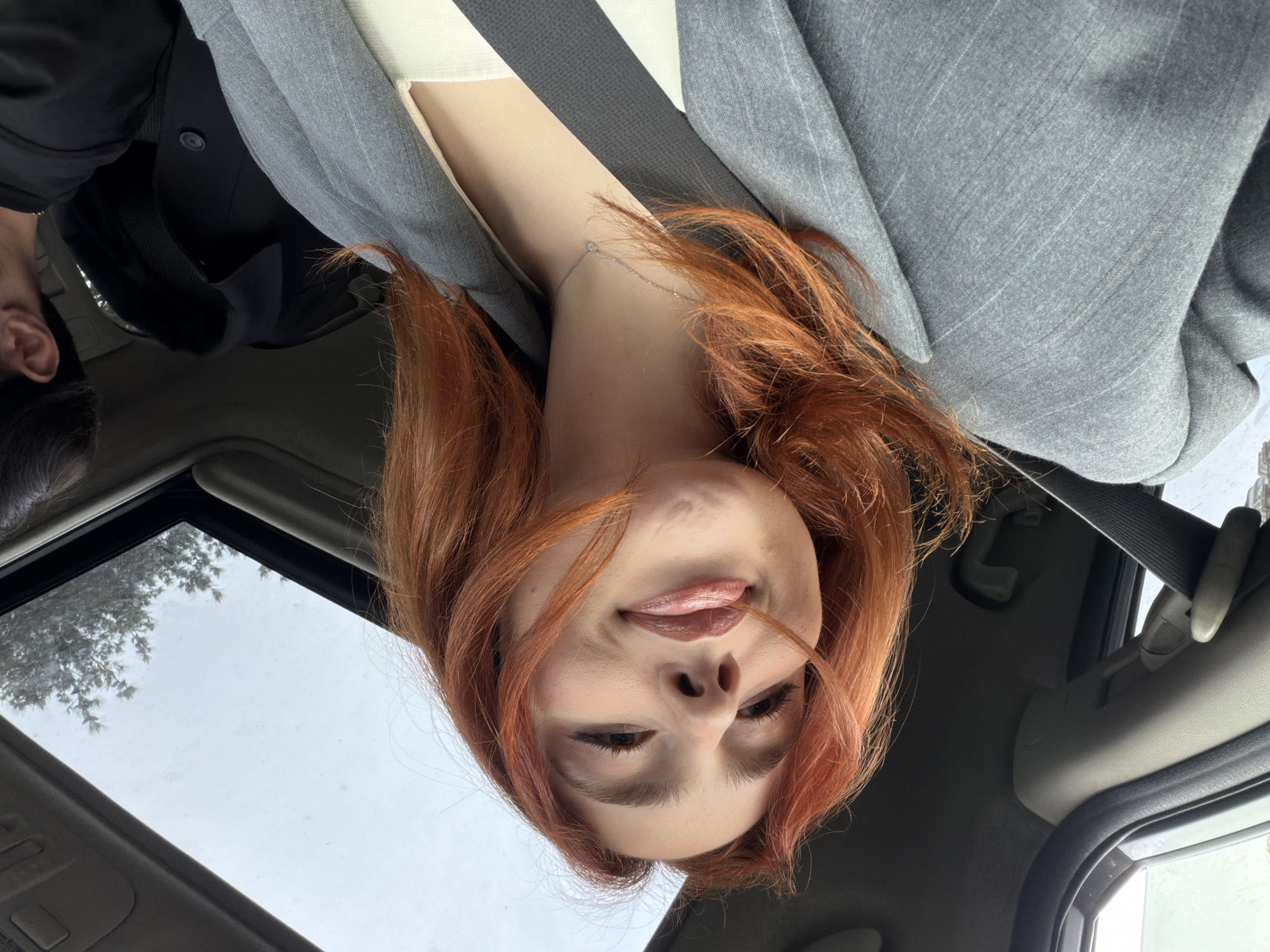 Woman takes playful car selfies in Tbilisi