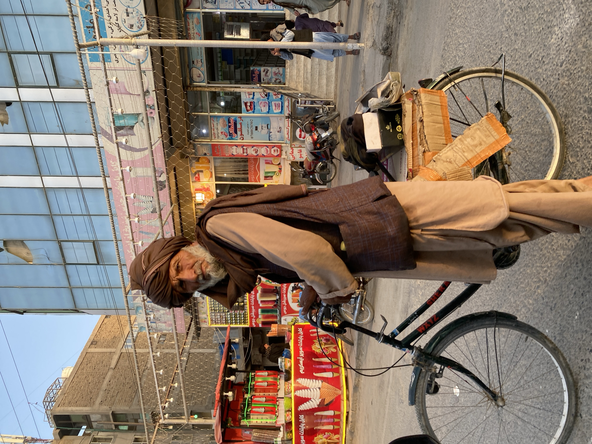 Everyday street life in a Kandahar commercial district