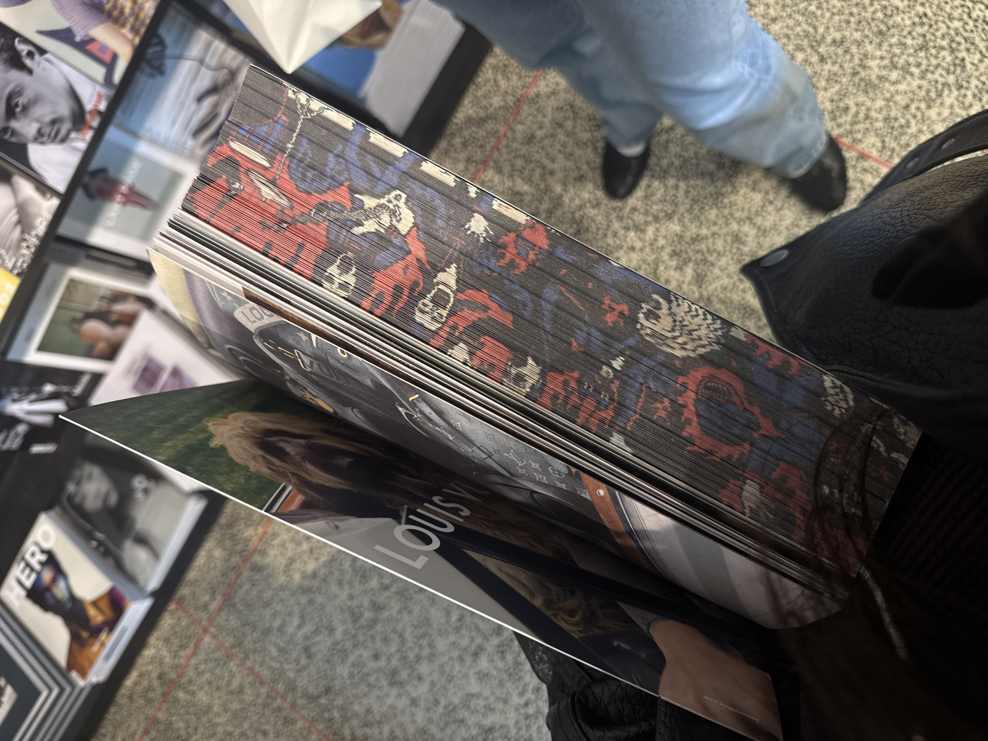 London shopper documents retail displays during afternoon browsing session