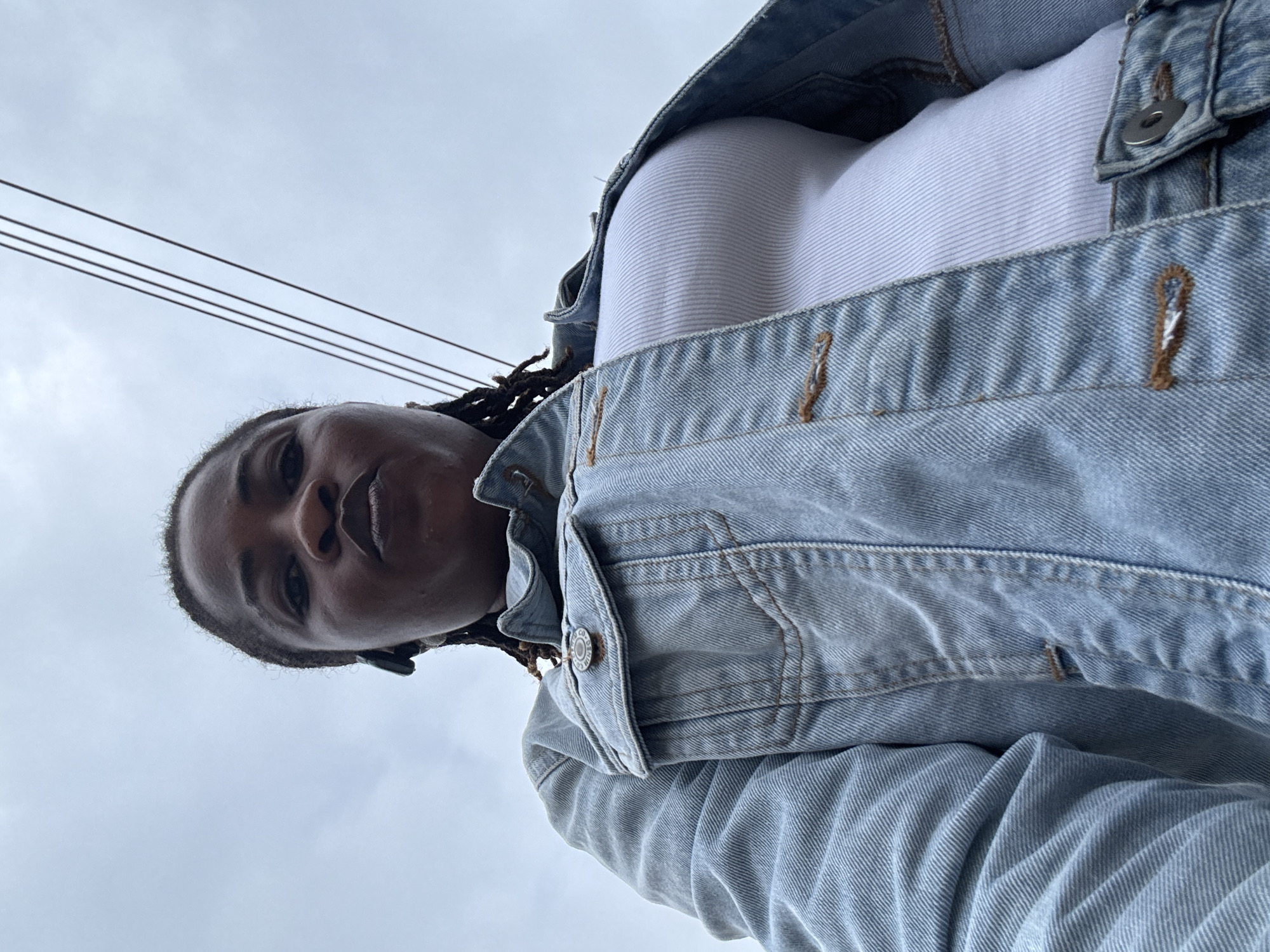 Morning selfie series in Ajara, Nigeria, overcast skies overhead