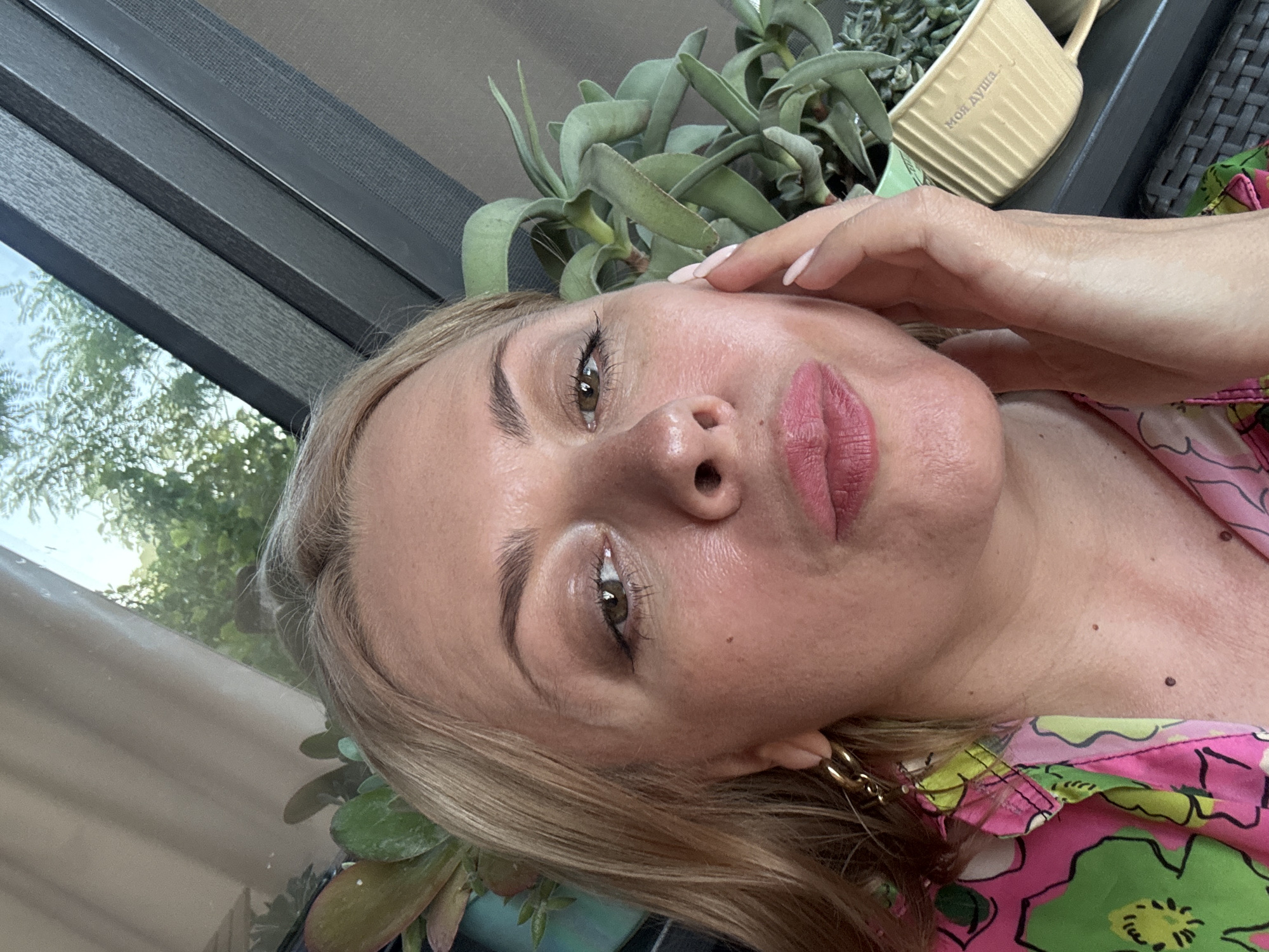 Relaxed patio selfie session in Sochi on a summer afternoon.
