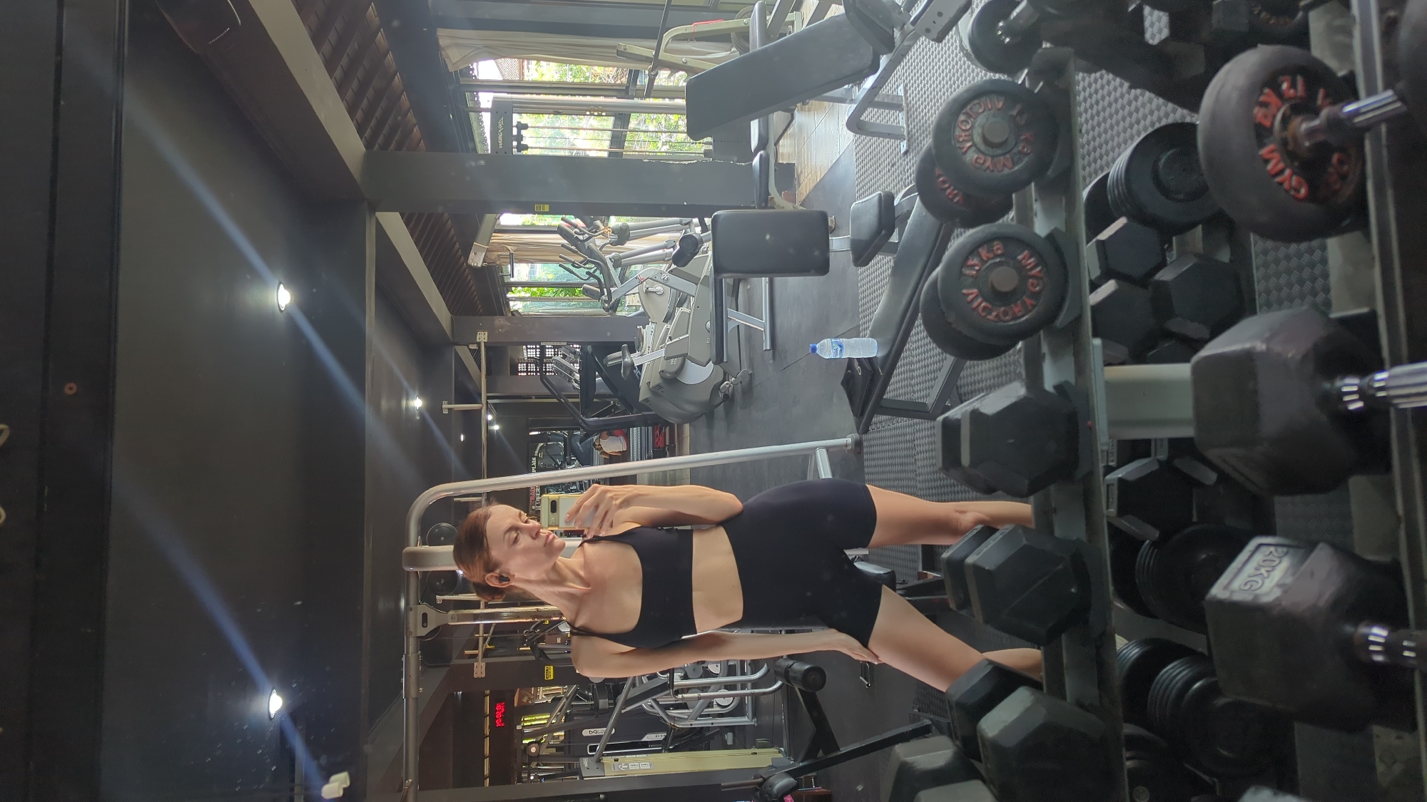 Woman takes gym selfies in Mengwi, Indonesia early morning