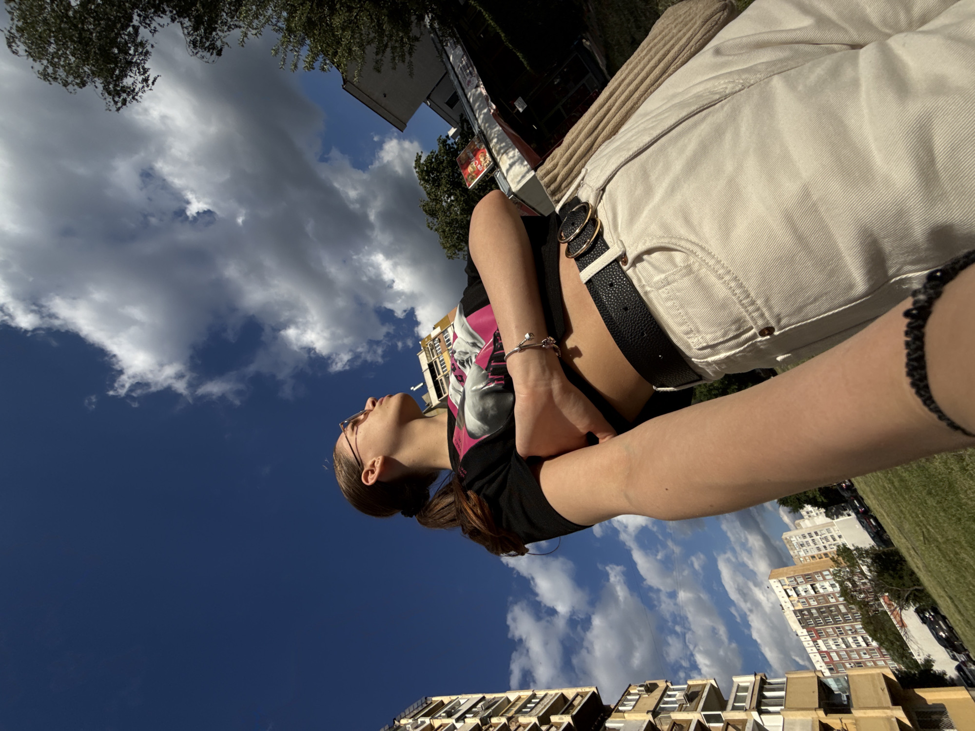 Woman photographed outdoors in Sofia on sunny afternoon