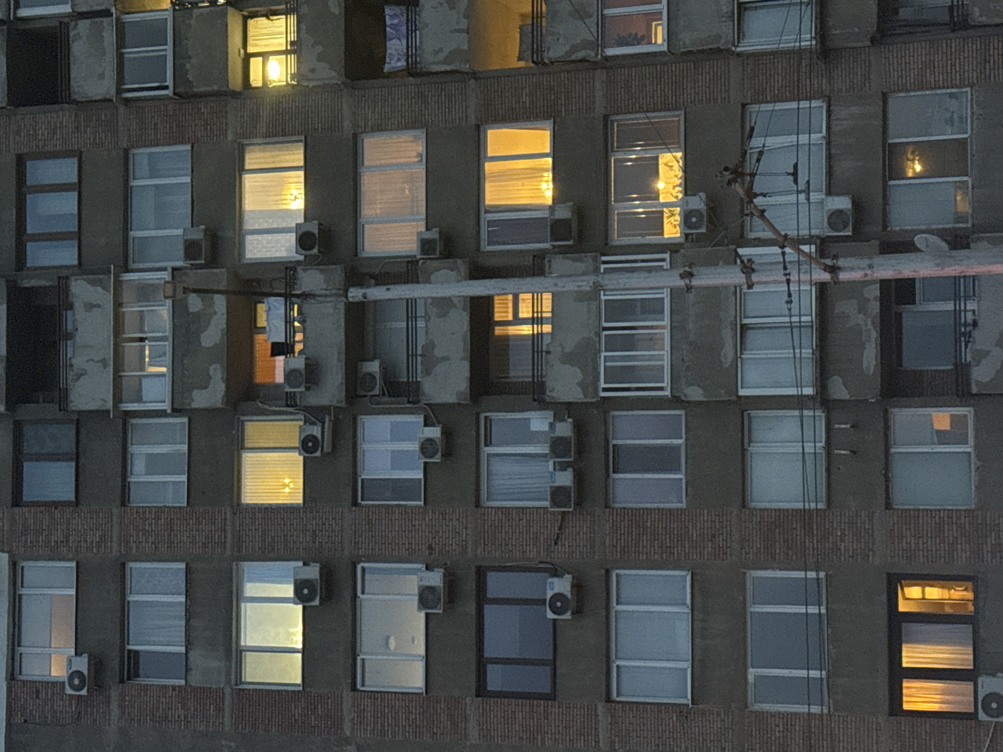 Evening lights illuminate Sofia apartment building windows