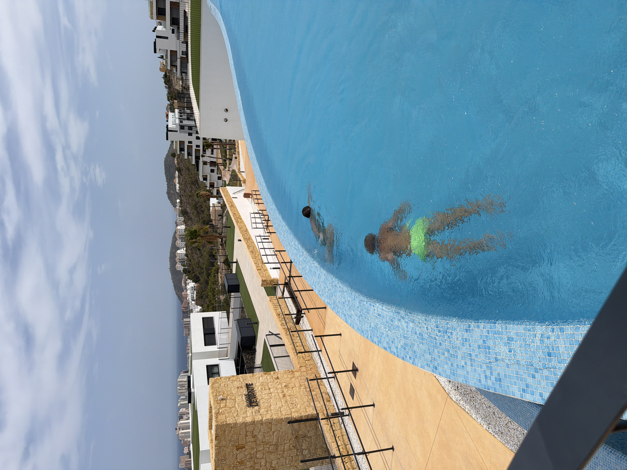Modern resort-style complex in Finestrat with pools and mountain views