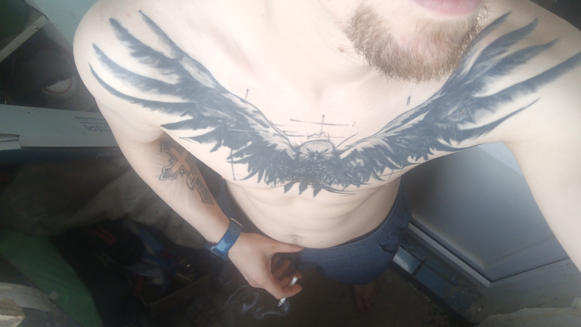 Relaxed morning at home, chest tattoo and everyday objects
