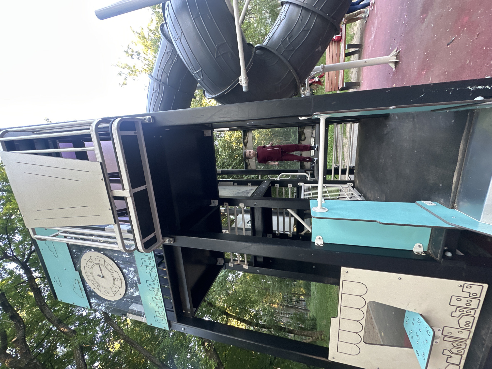 Afternoon at a Moscow residential playground, mid-summer.