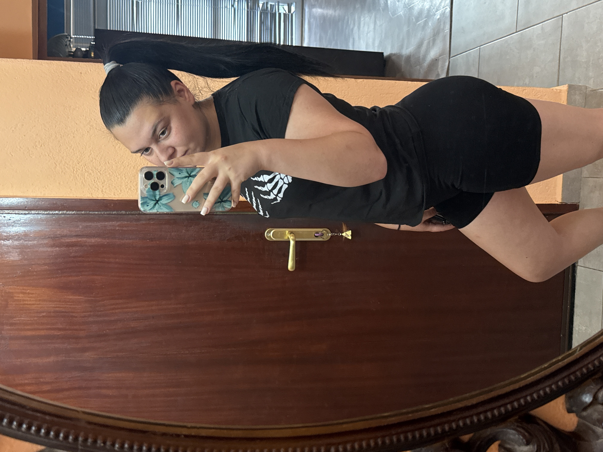Woman takes morning selfies indoors in Rogosh, Bulgaria
