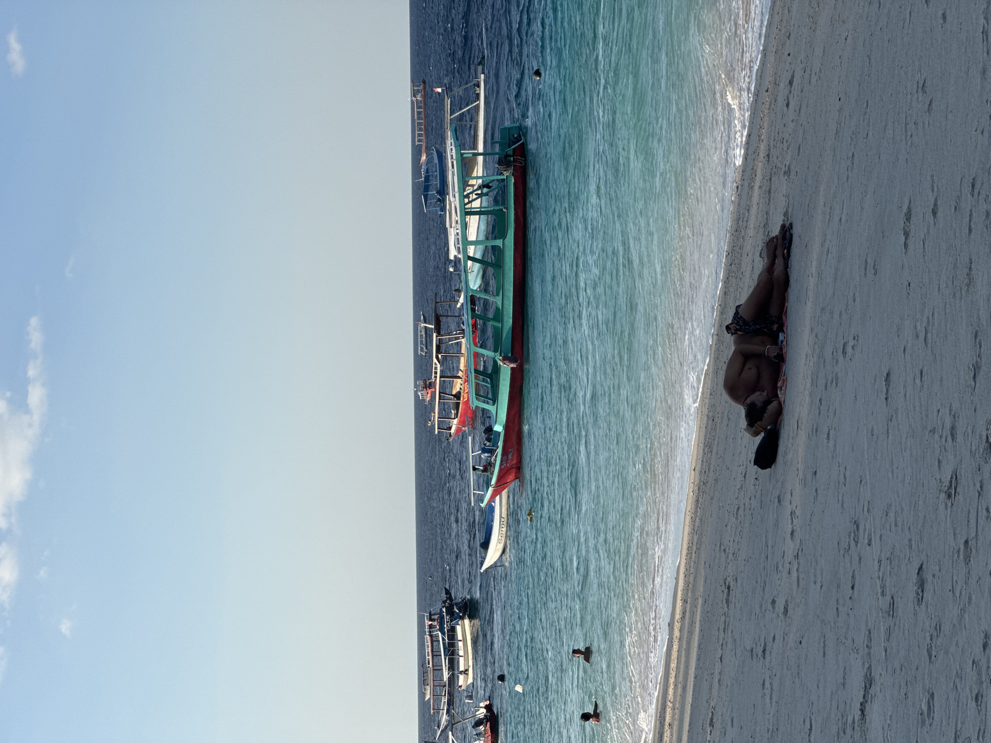 Lazy morning on a Lombok beach, shells and turquoise water