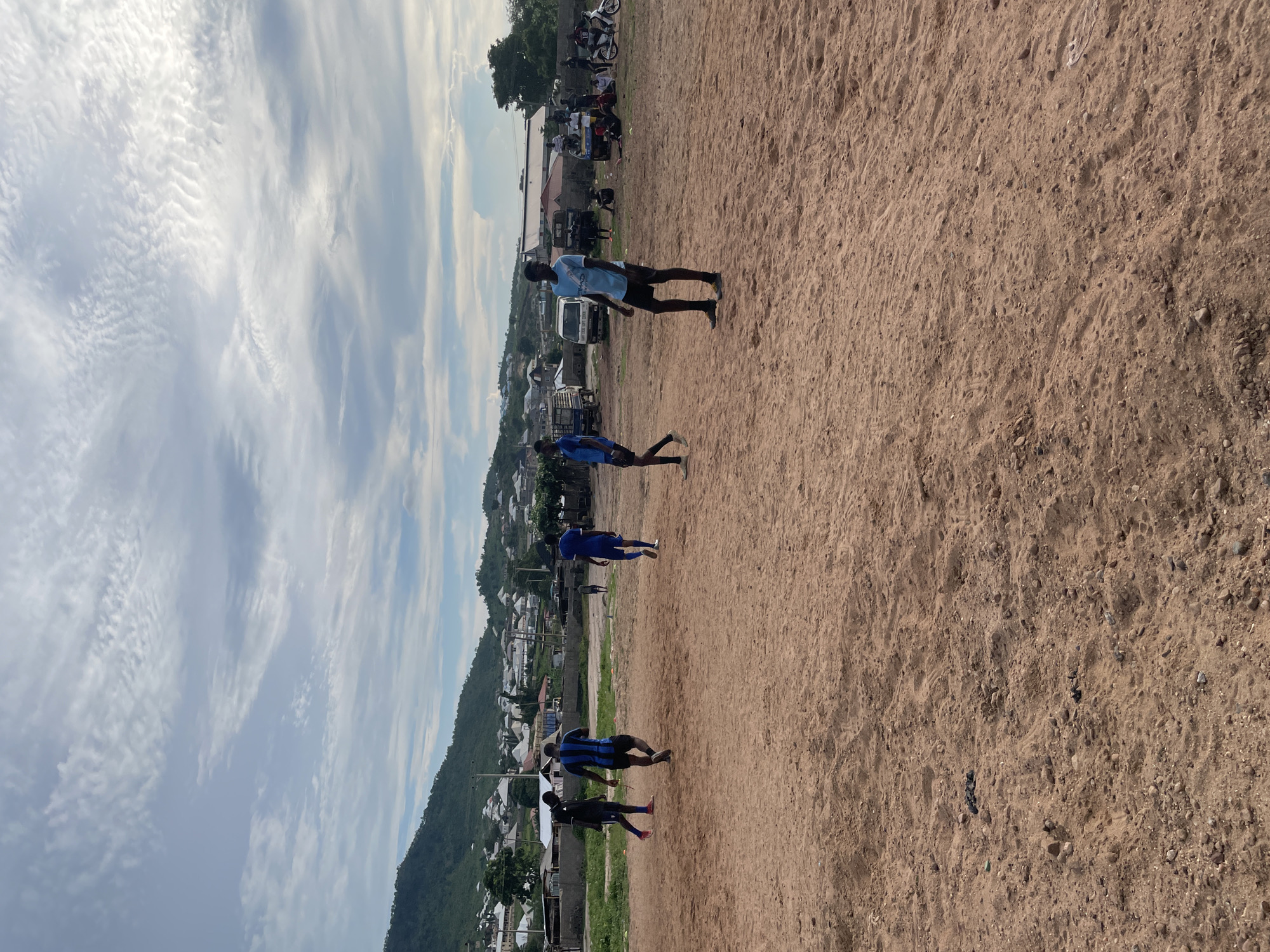 Football session on a dusty pitch in Lokoja, Nigeria