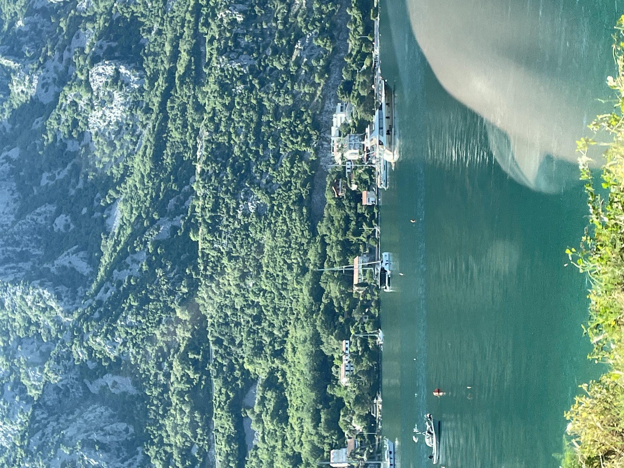 Aerial views captured of mountainous Kostanjica village, Montenegro