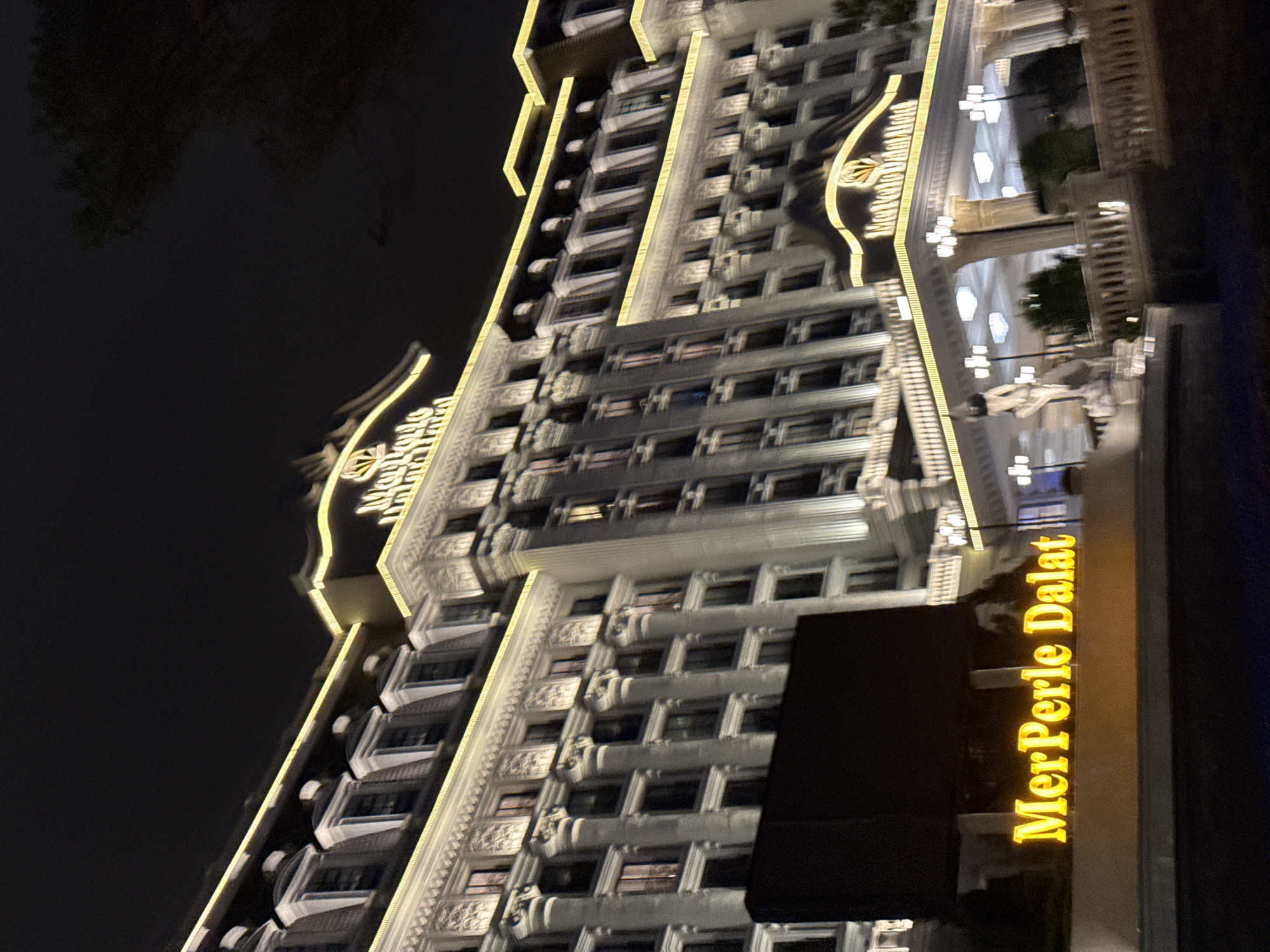 MerPerle Dalat Hotel glowing at night in Da Lat