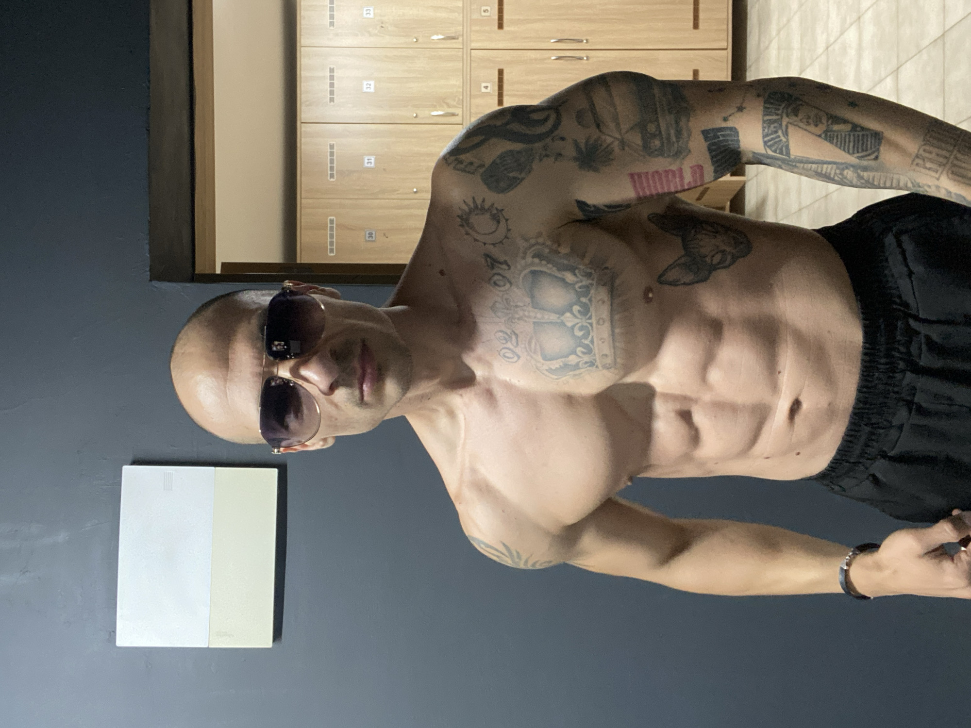 Tattooed man photographed posing in Pleven, Bulgaria