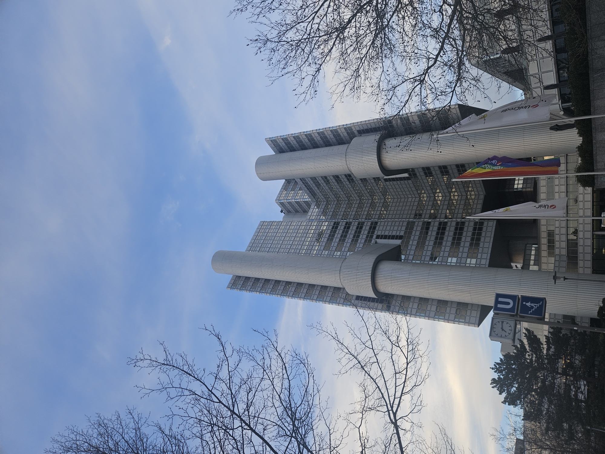 Munich HVB Tower photographed from below against blue sky