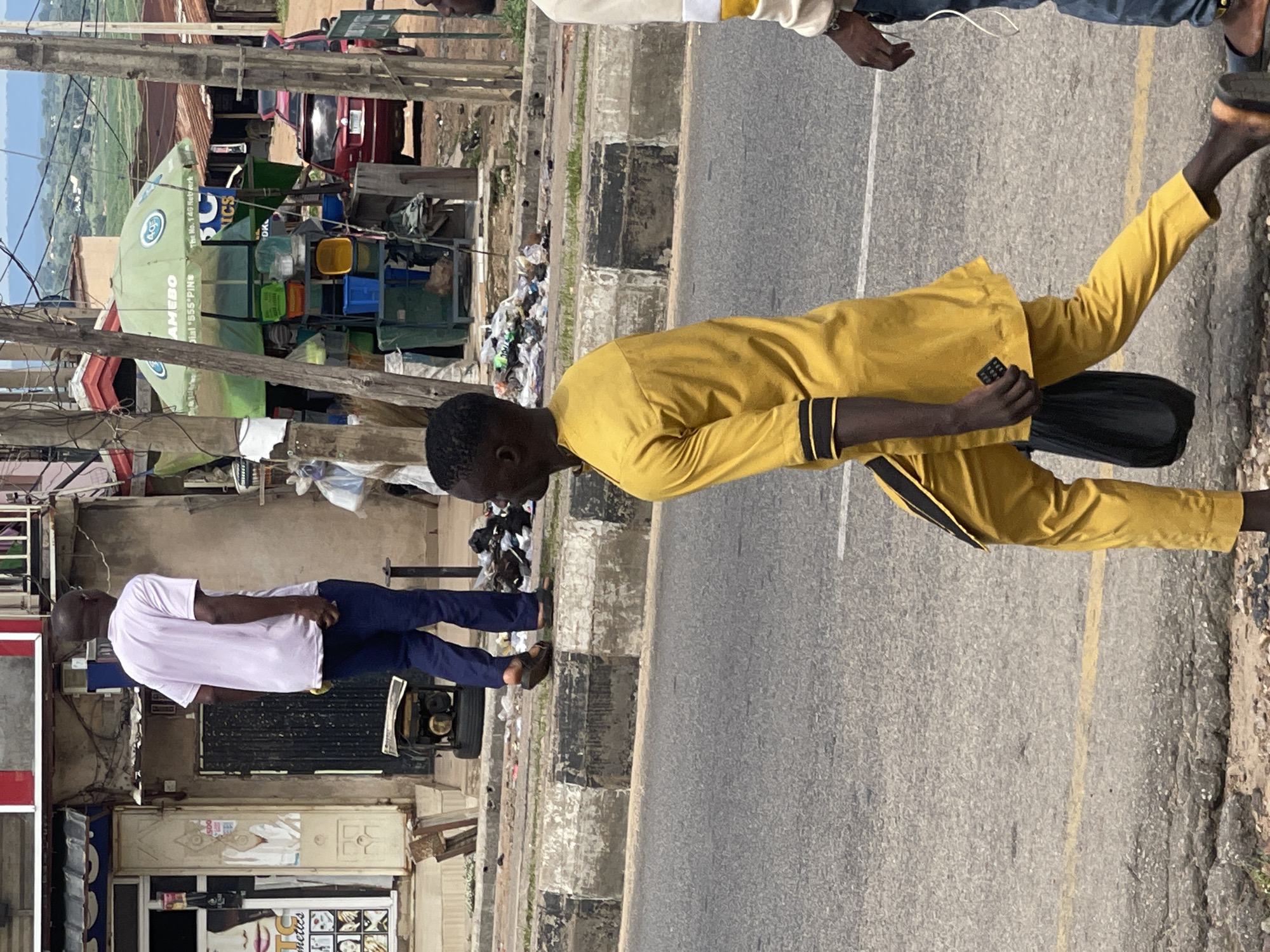 Everyday street life in a busy West African urban neighborhood