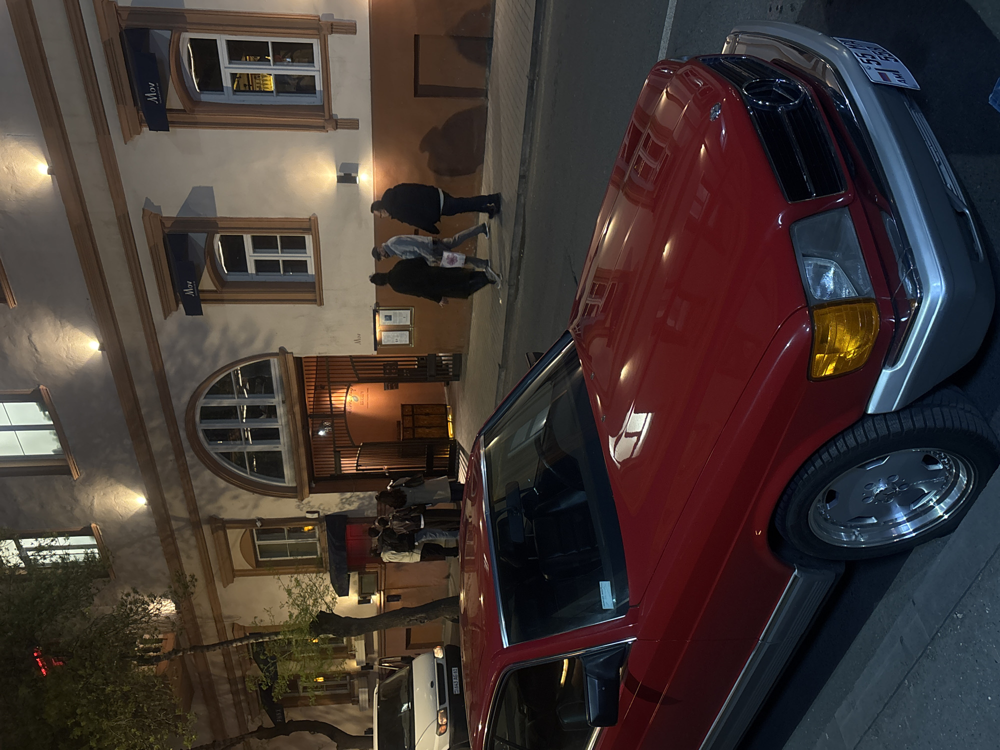 Red Mercedes parked on busy Yerevan street draws attention
