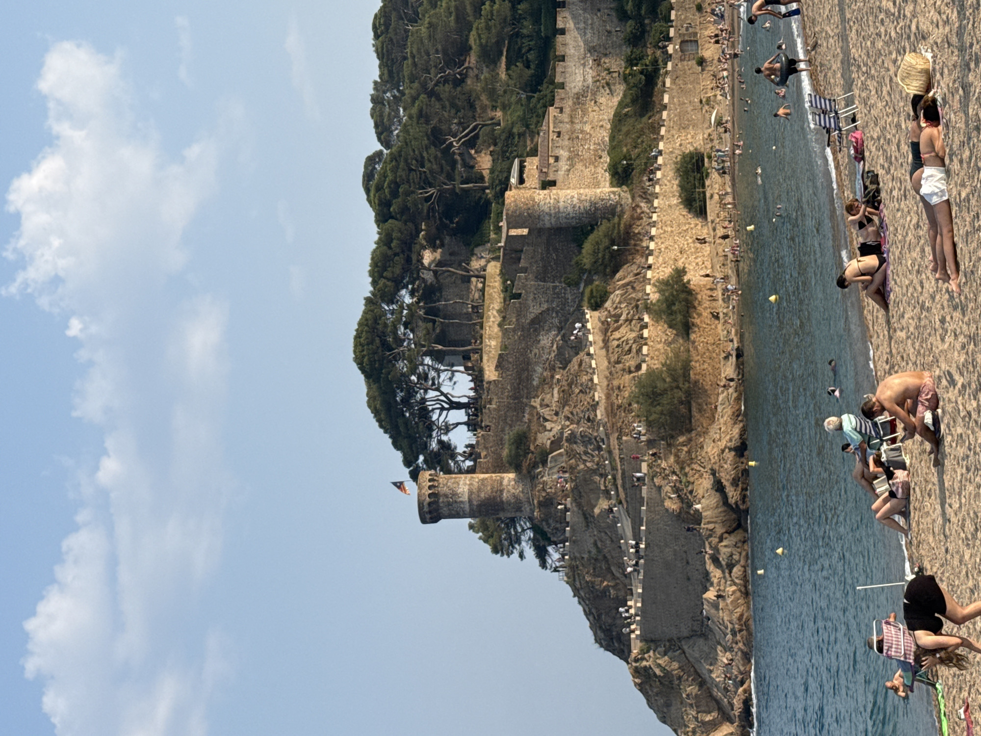 Tossa de Mar beach and Vila Vella castle on a summer afternoon