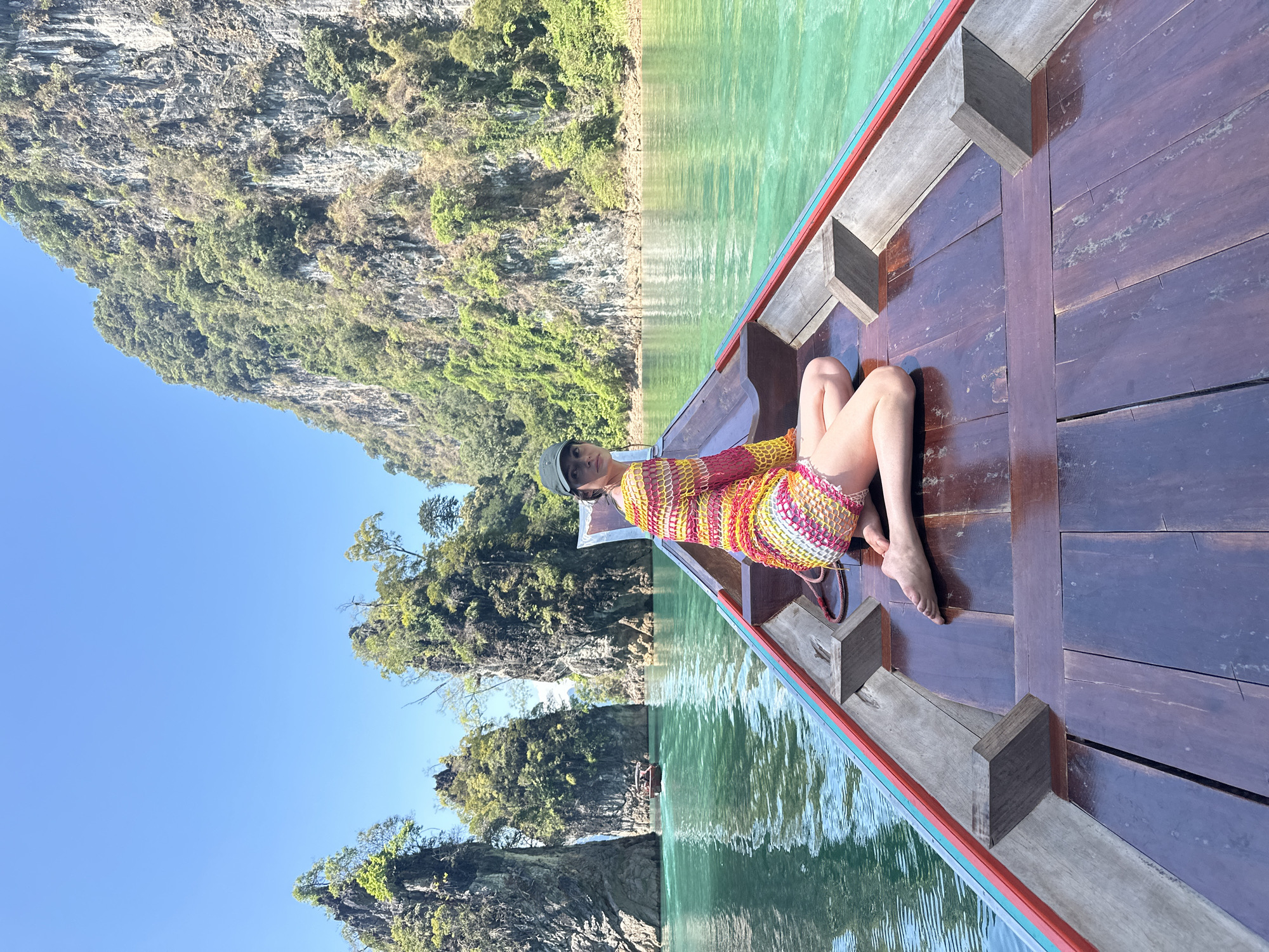 Tourists explore Thailand's Khao Phang limestone karsts by longtail boat