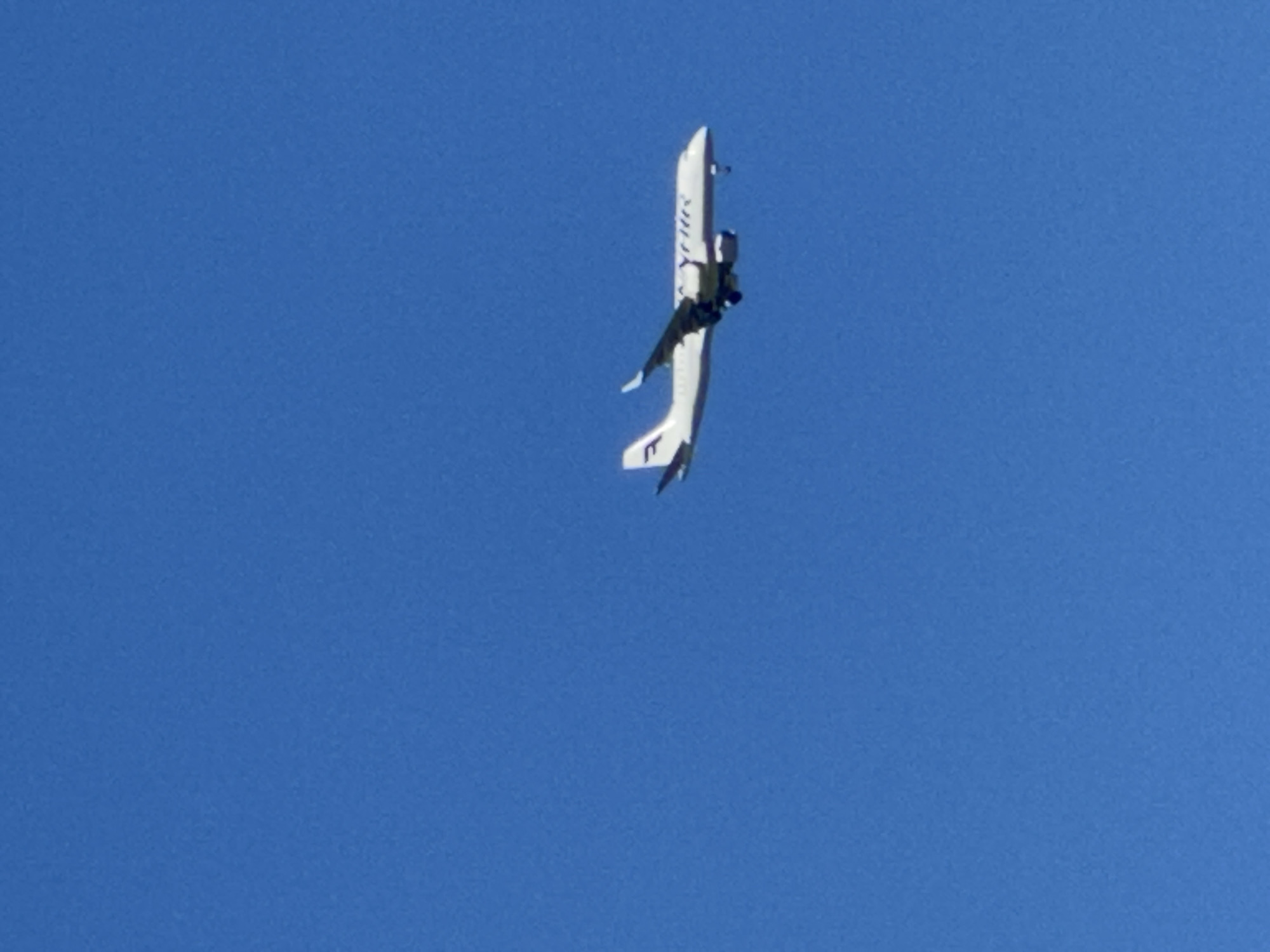 Lazy summer morning outdoors, coffee in hand, planes overhead