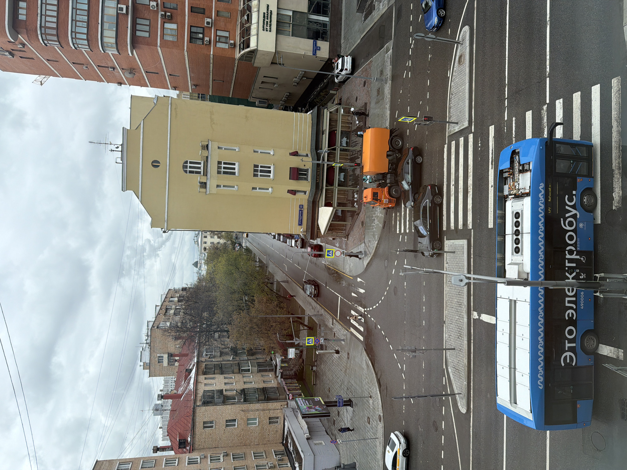 Moscow intersection bustling with traffic under overcast skies