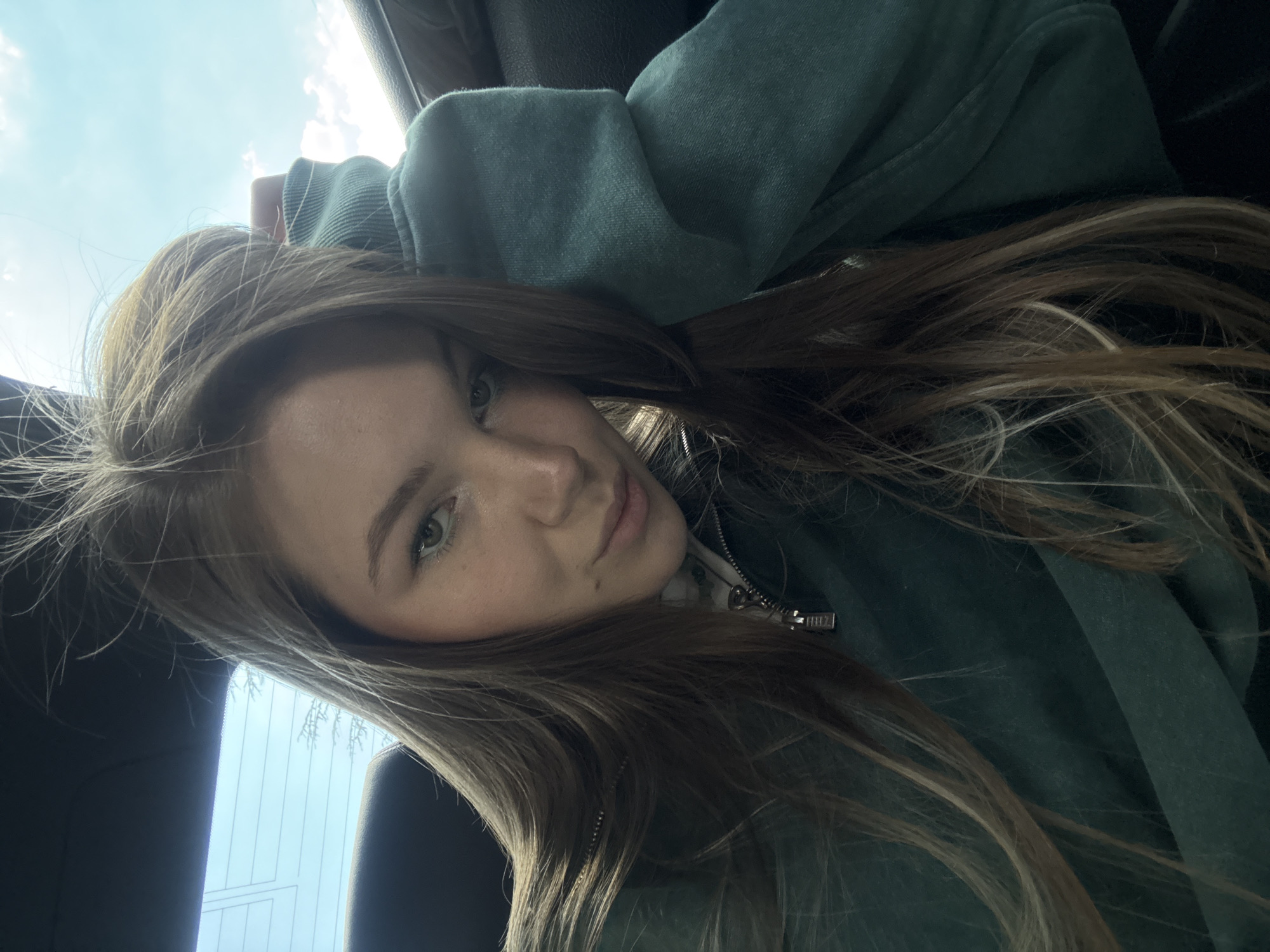 Woman in green hoodie spotted in vehicle near Belgrade