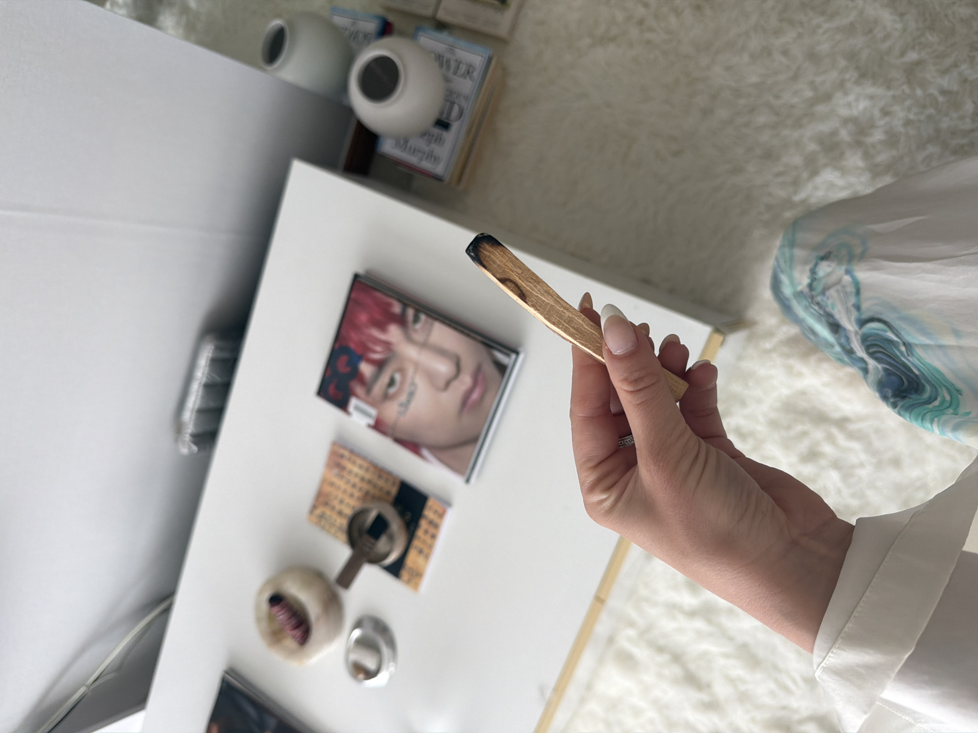 Woman documents private morning moment with palo santo in Seoul