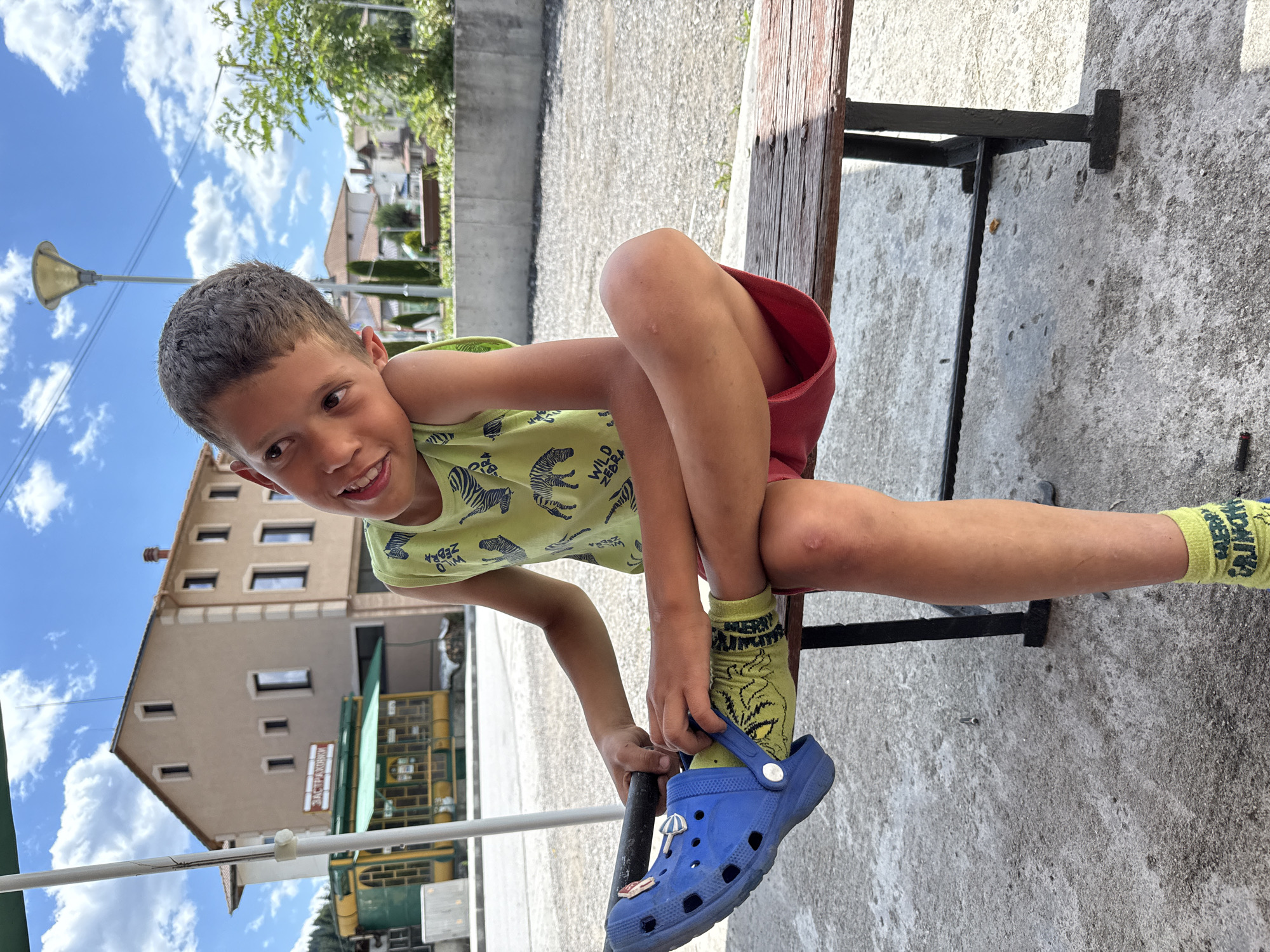 Afternoon stop at a shaded bench in Barutin's town square