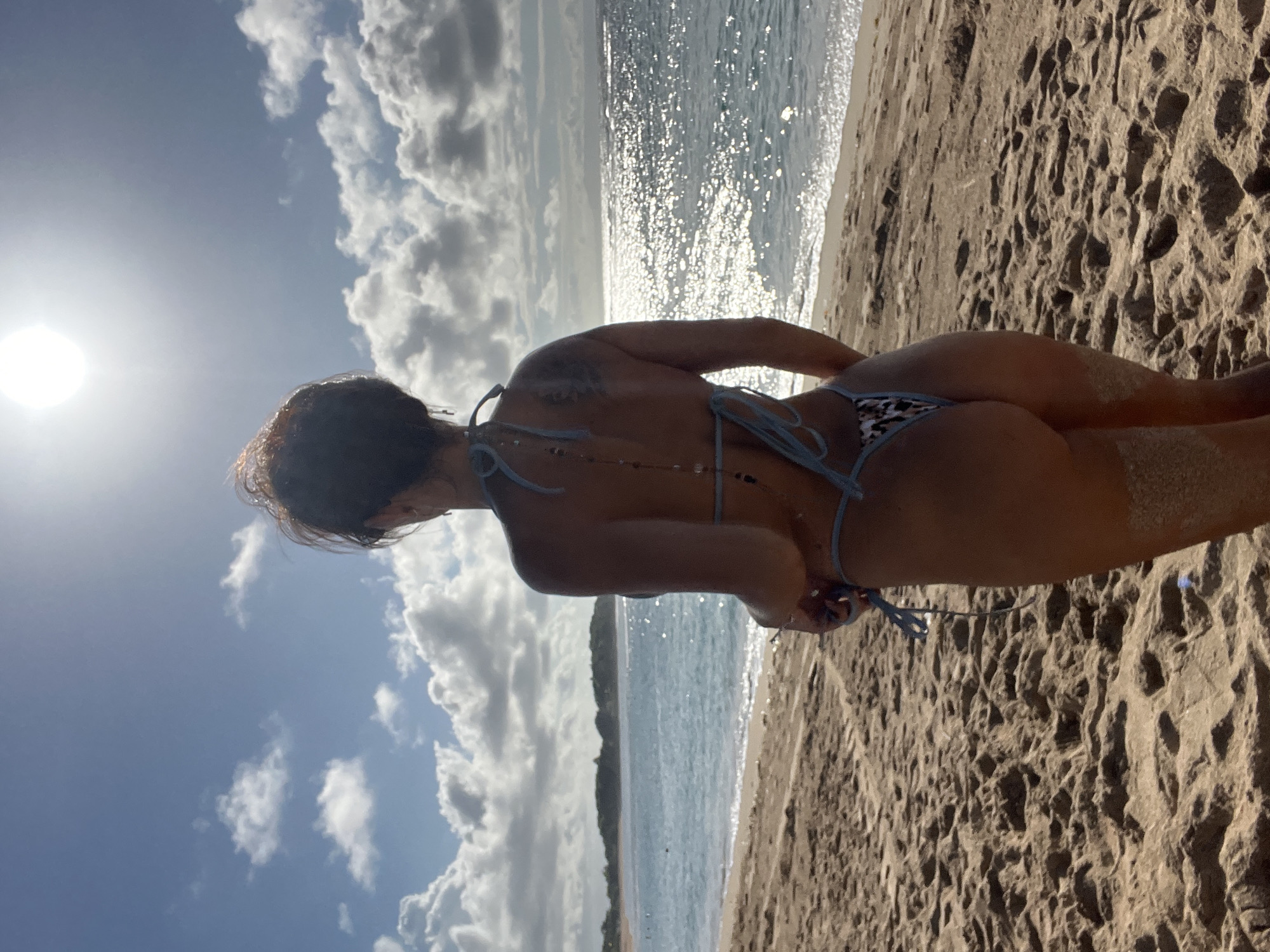 Woman enjoys beach day at Kuta Selatan, Indonesia