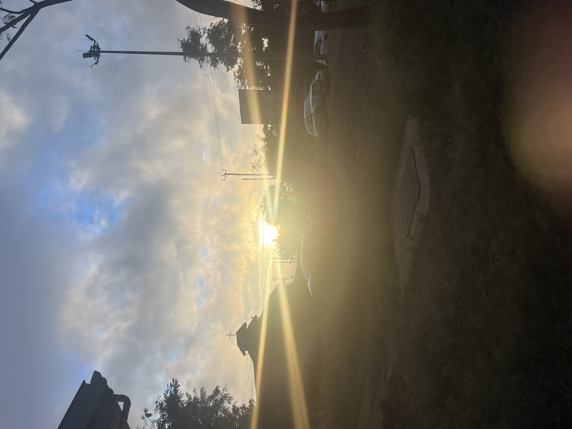 Bright sunlight silhouettes church in daytime Nairobi scene