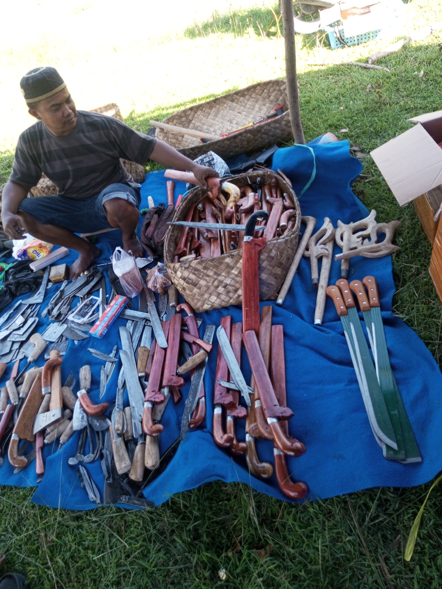 Outdoor market scene in Turumame, Indonesia with diverse vendors