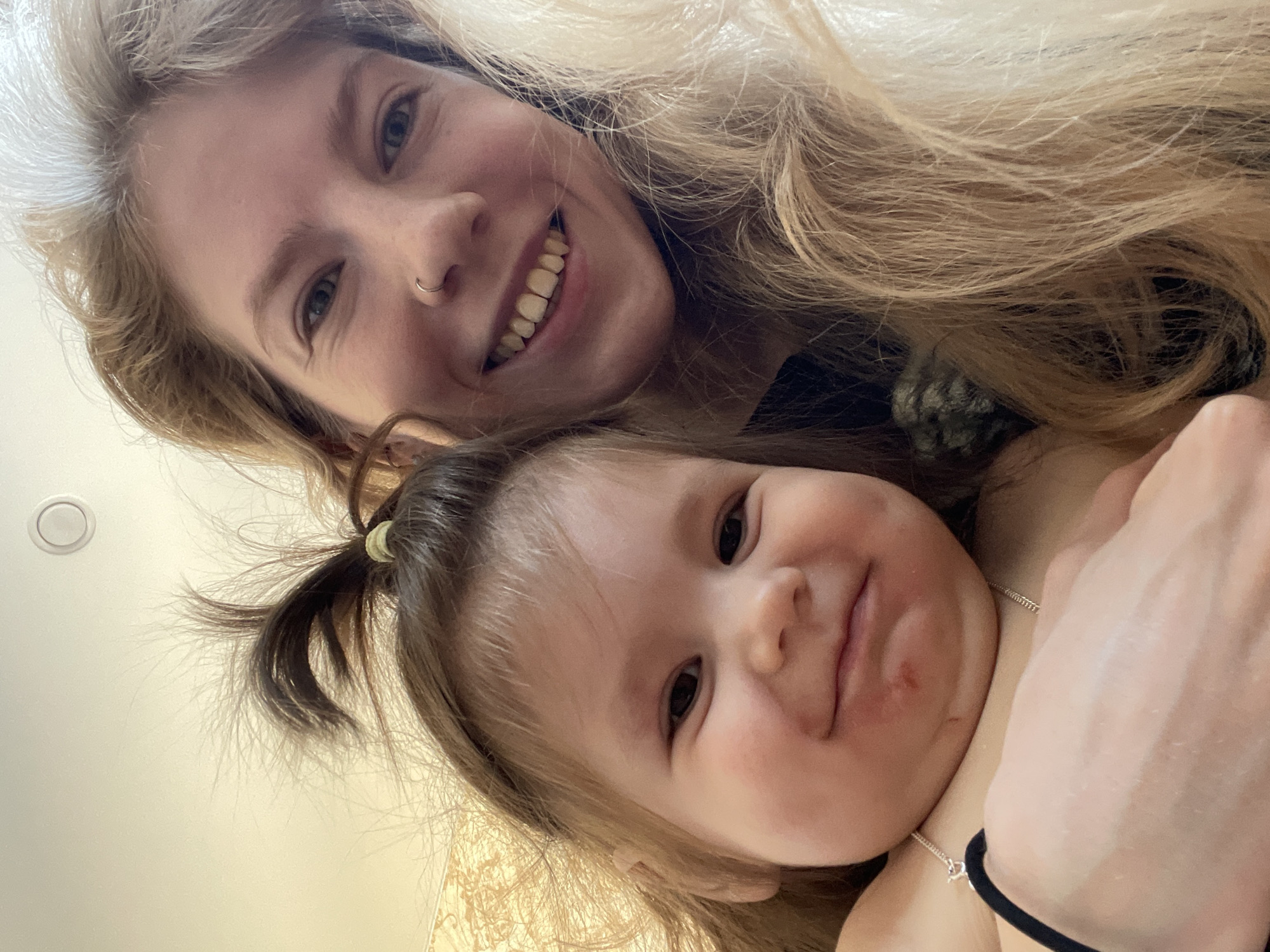 Woman takes selfie with toddler in Izhevsk