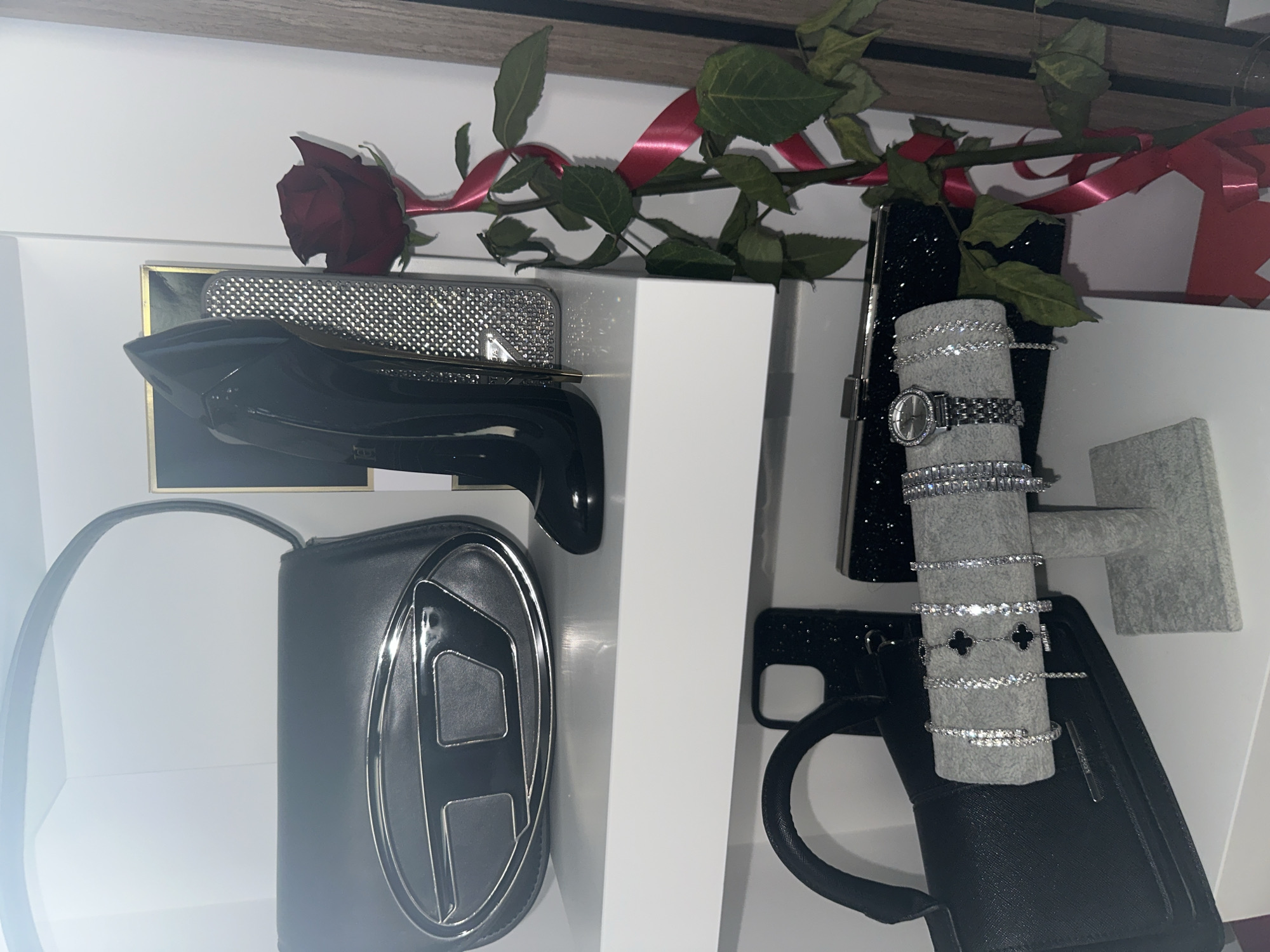 Luxury accessories displayed in organized retail arrangement
