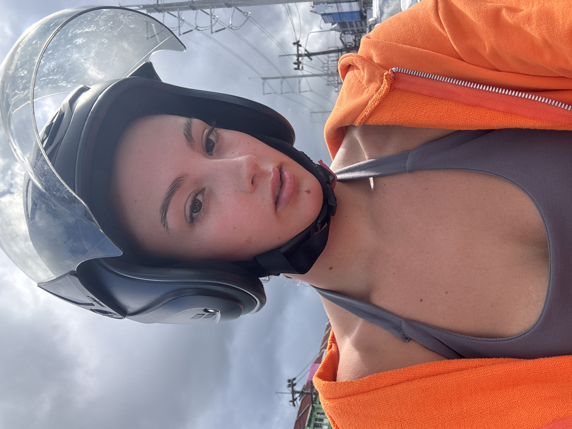 Woman in motorcycle gear photographed in Ratsada, Thailand
