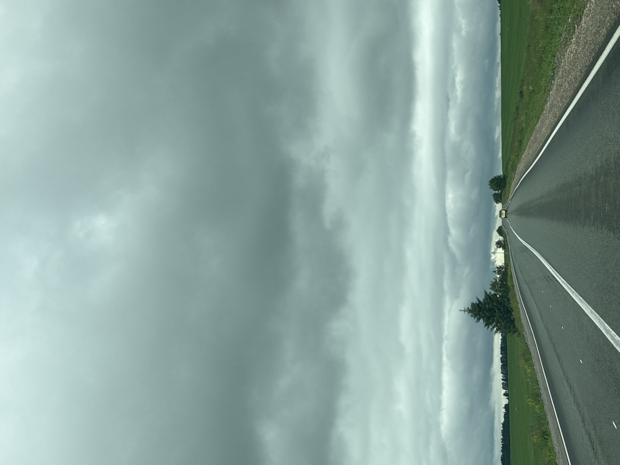 Overcast morning road conditions documented in Niva, Russia