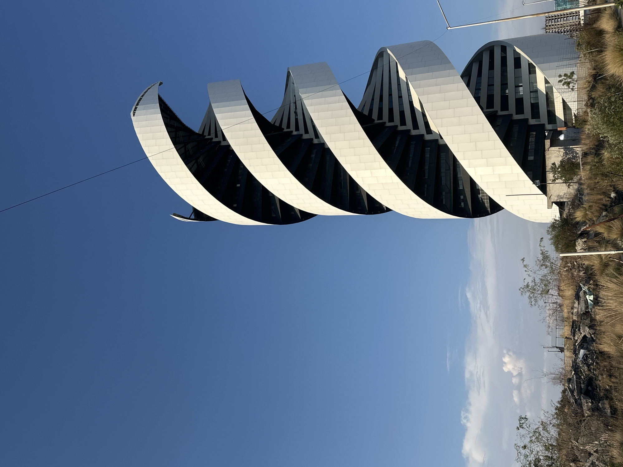 Person films Solara Towers from car in Tlaxcalancingo
