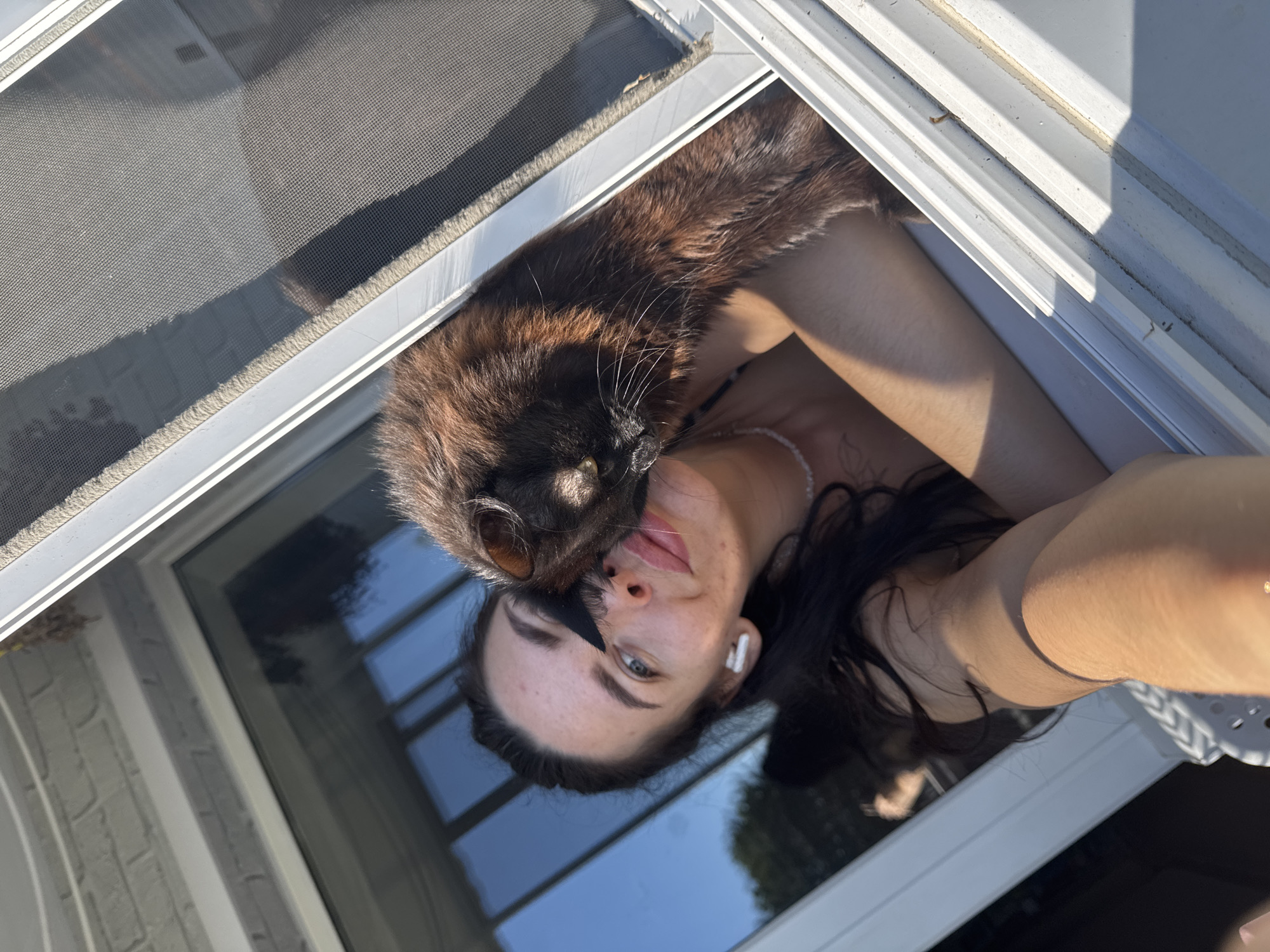 Balcony selfies with a black cat in Chaikovsky, Russia