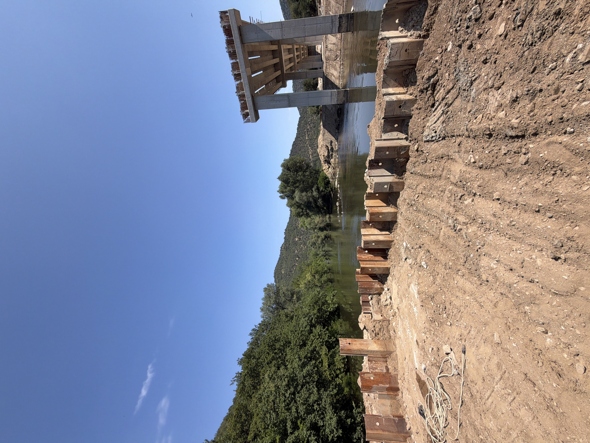 Bridge construction progresses along the river in Kresna, Bulgaria