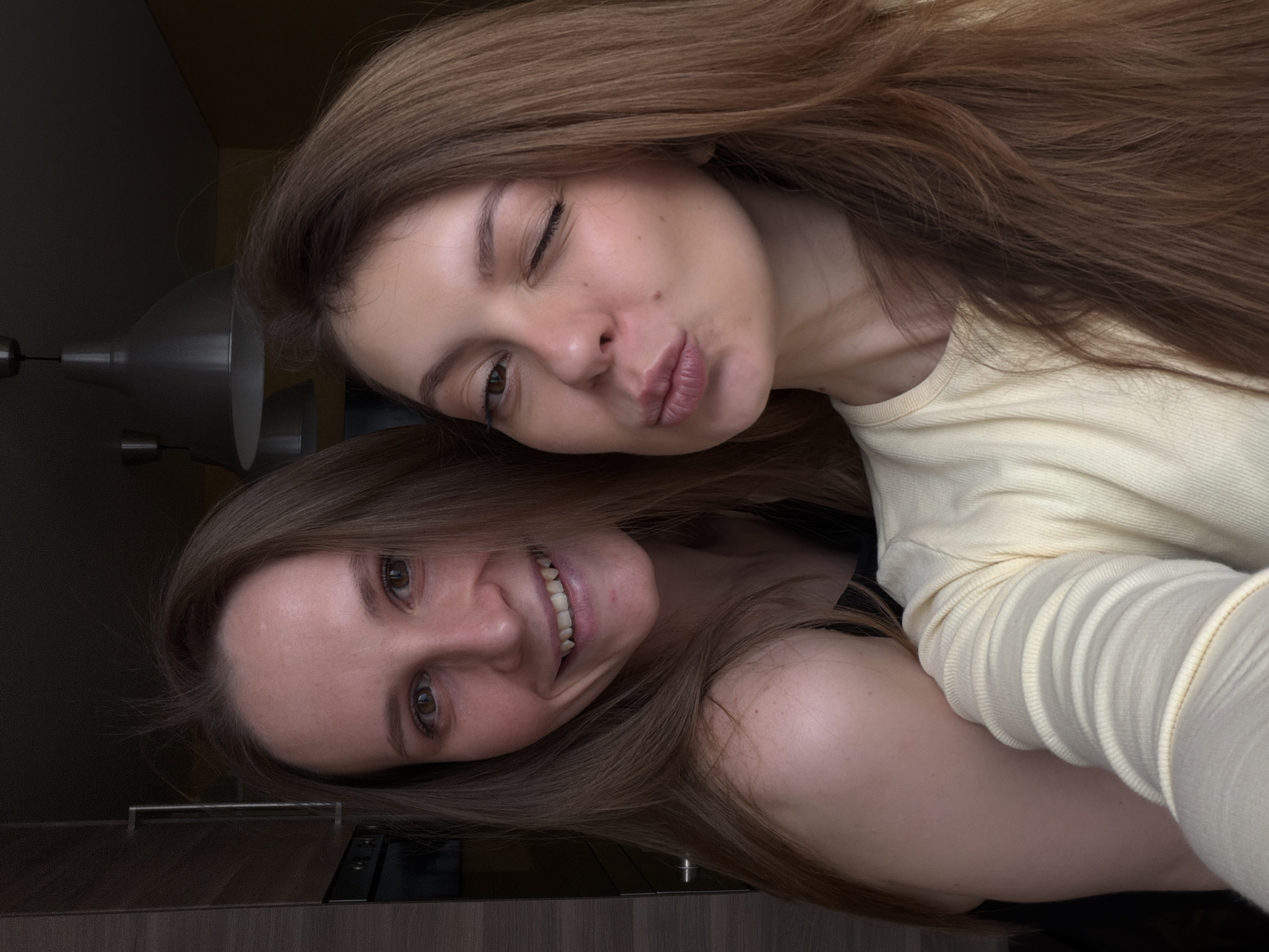 Women share selfies during casual meal gathering in Putilkovo