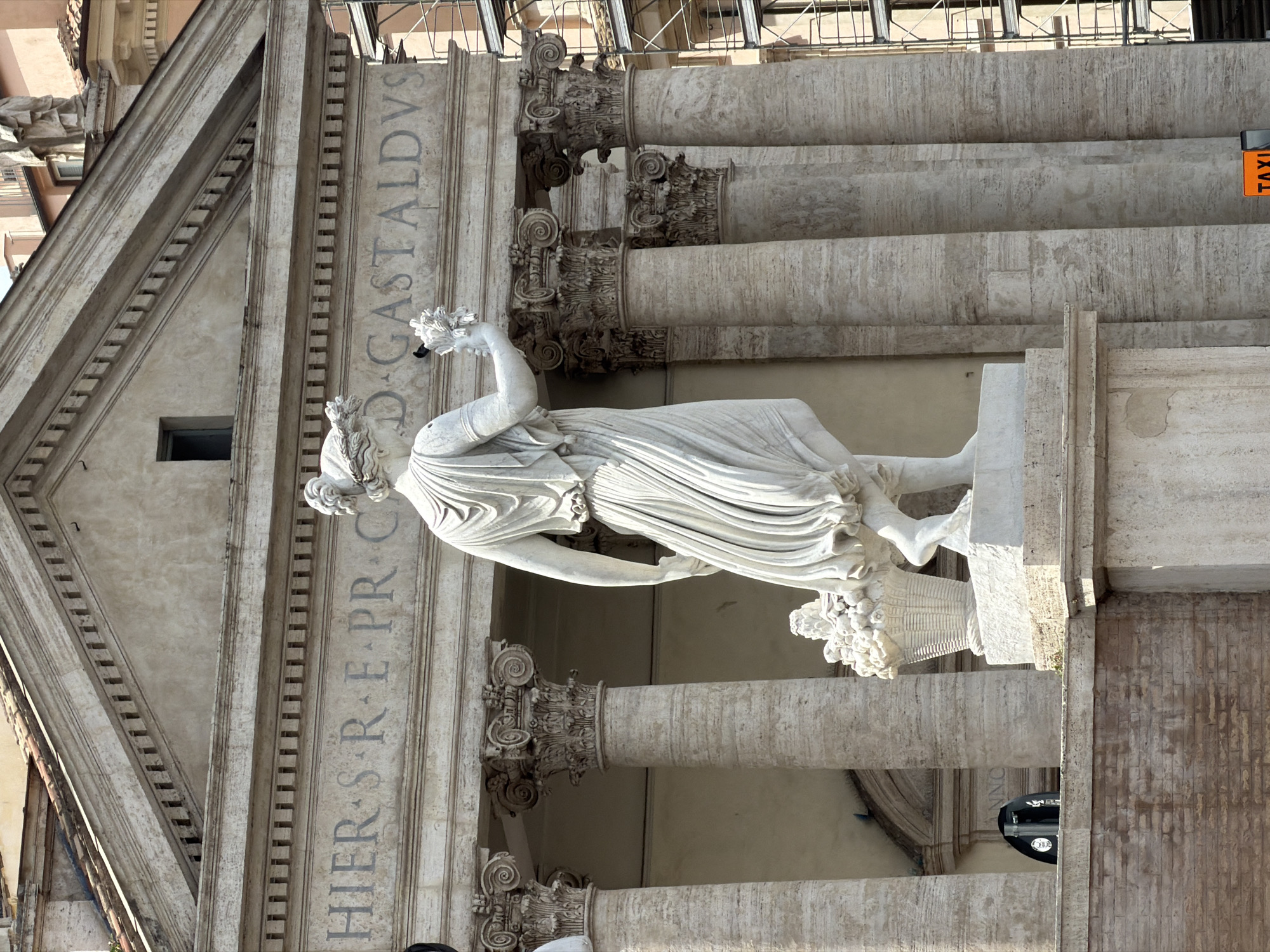 Morning street life unfolds around Rome's historic monuments